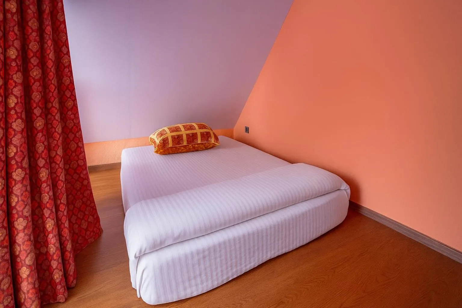 Bed in Rumourss Sky Villa & Resort