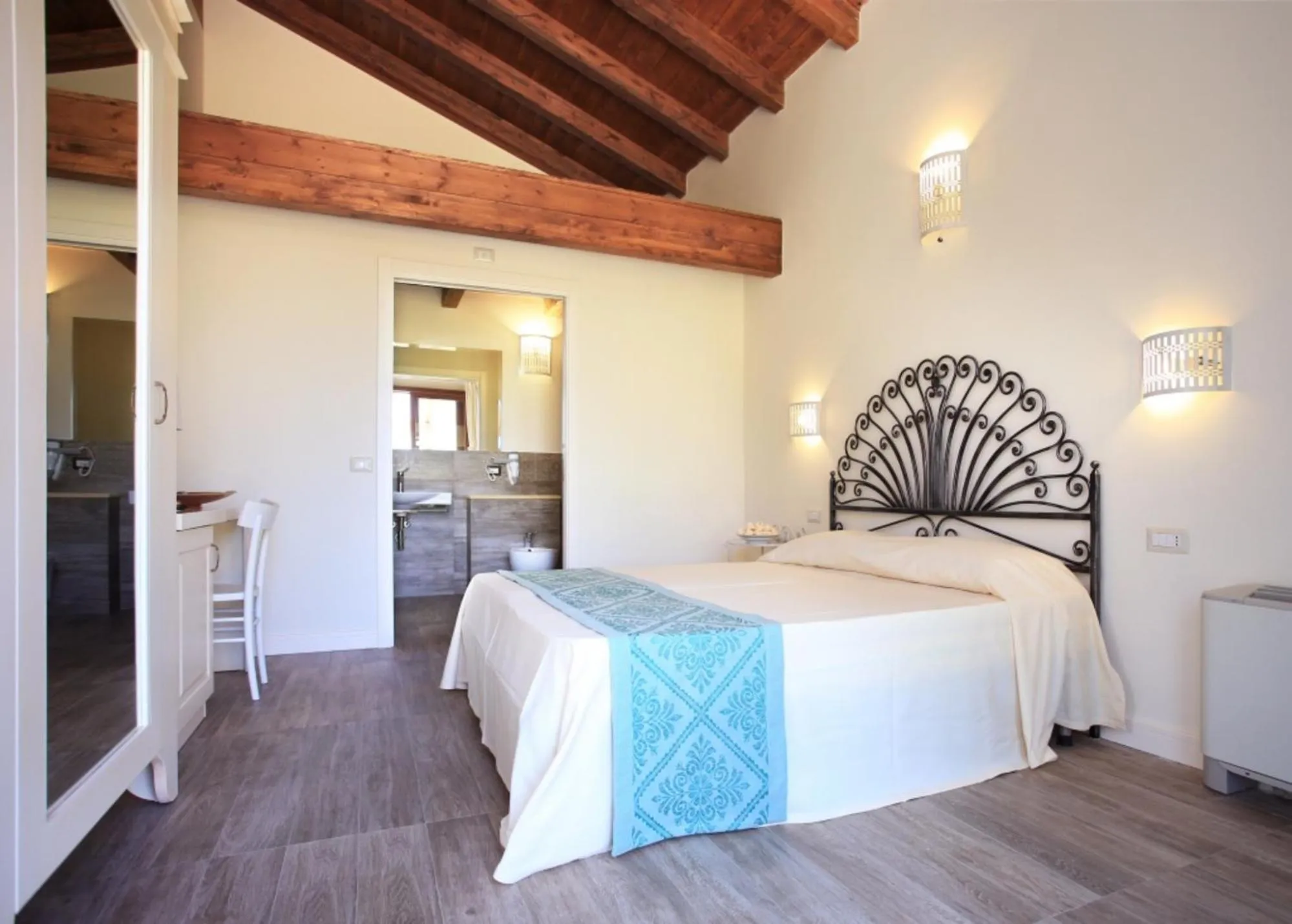 Bed in Inghirios Wellness Country Resort