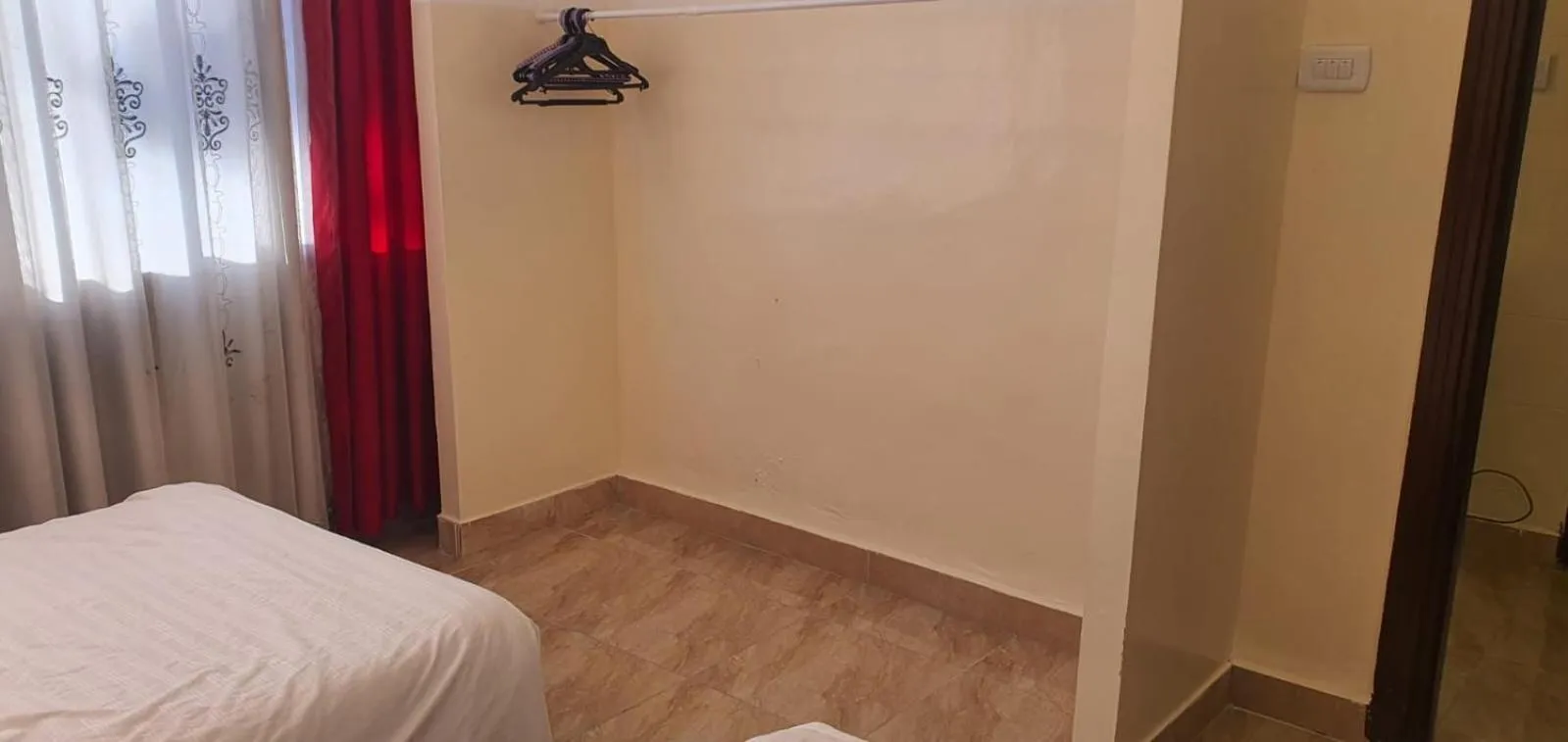 Bedroom in Aljazeera Hotel Apartments