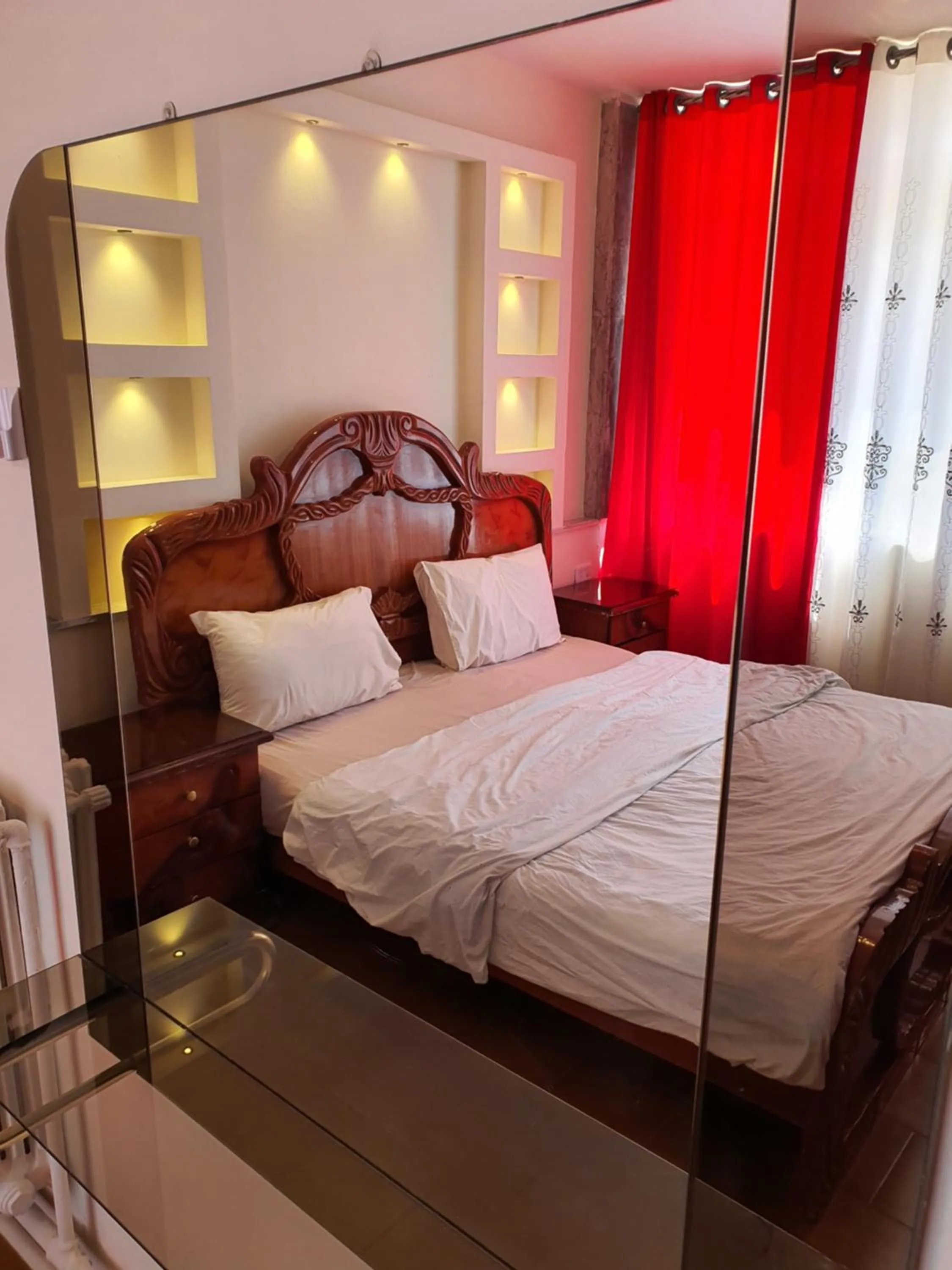 Bedroom in Aljazeera Hotel Apartments