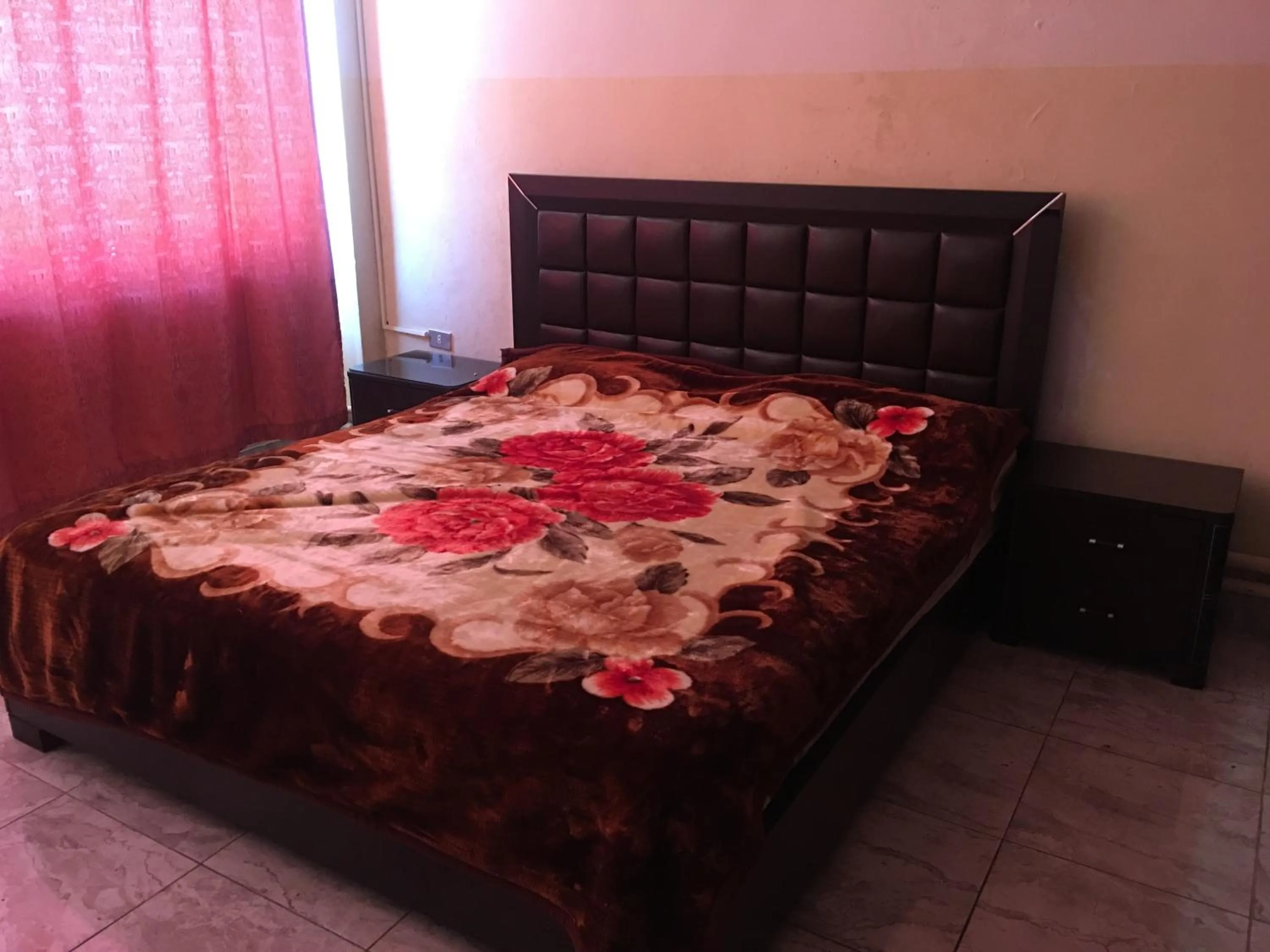 Bedroom in Aljazeera Hotel Apartments