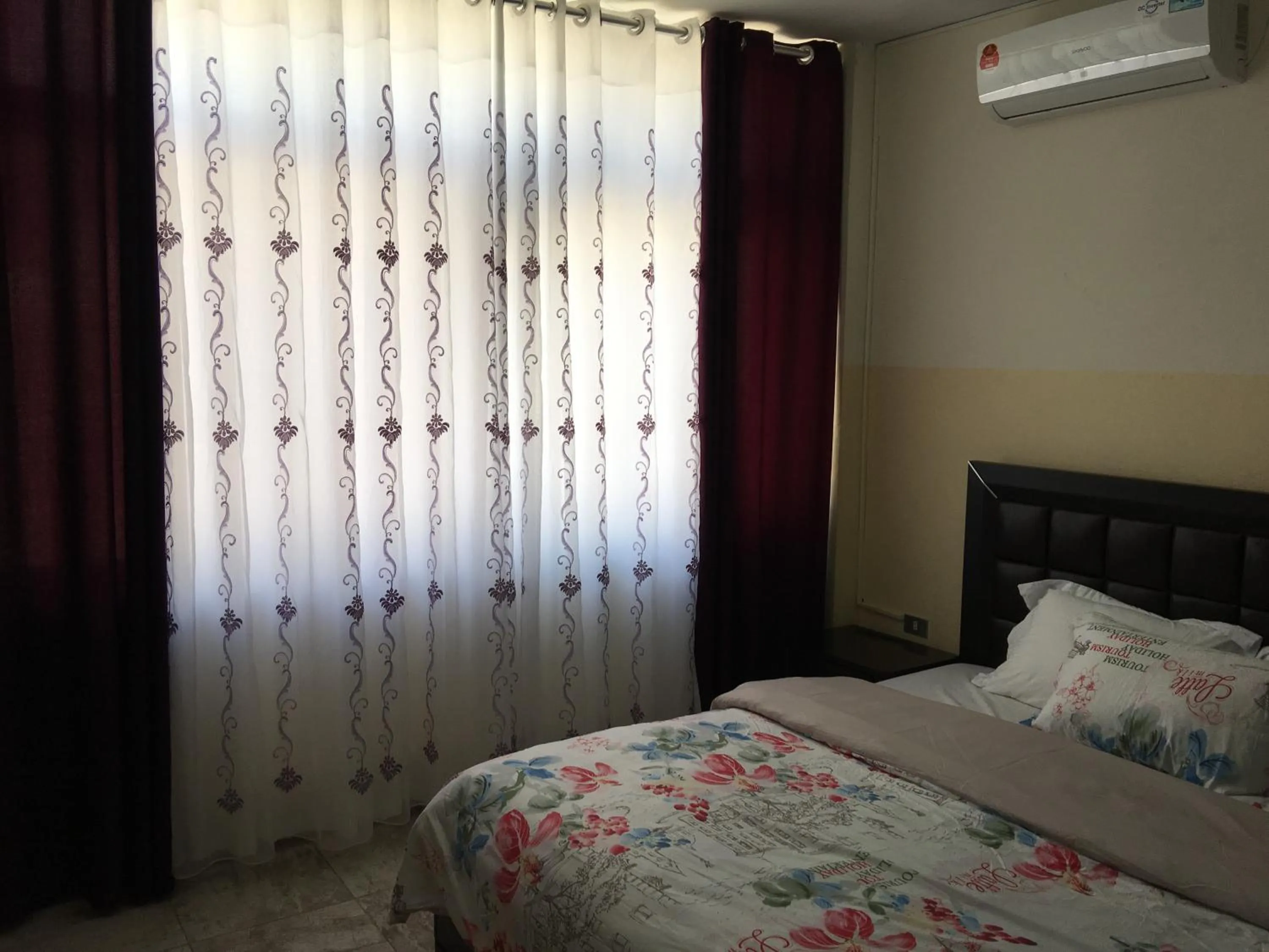 Bedroom in Aljazeera Hotel Apartments