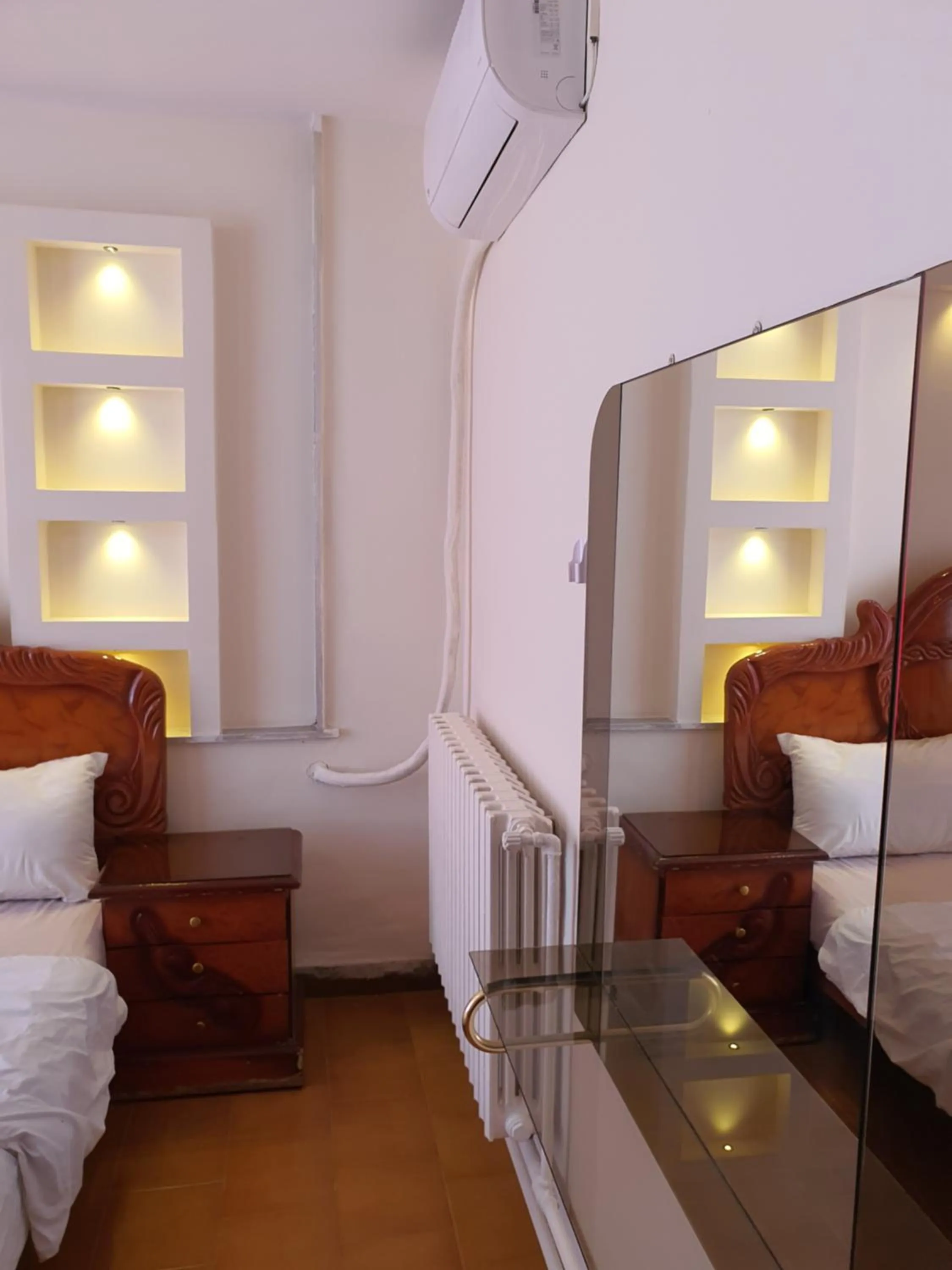 Bedroom in Aljazeera Hotel Apartments