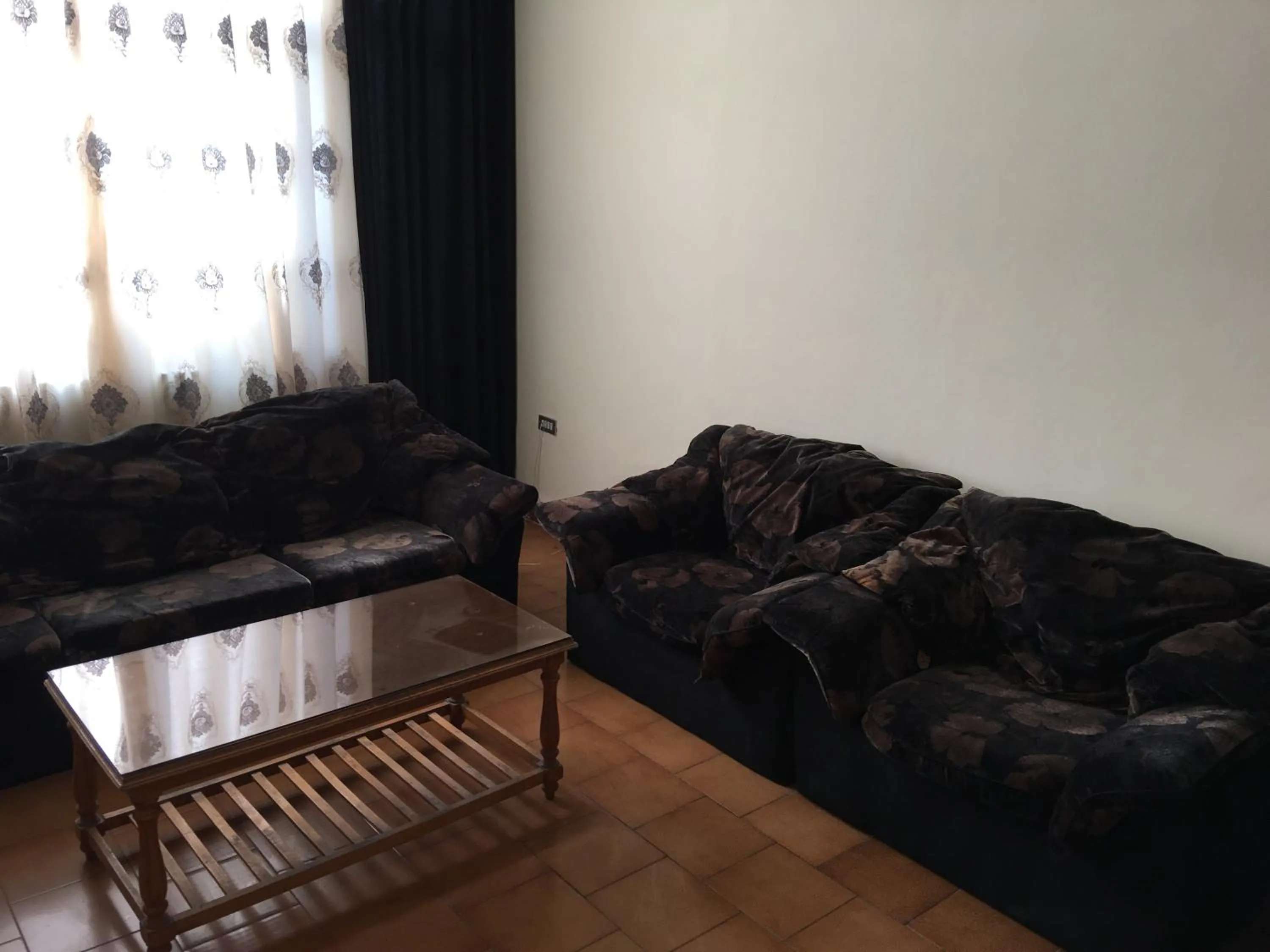 Living room in Aljazeera Hotel Apartments