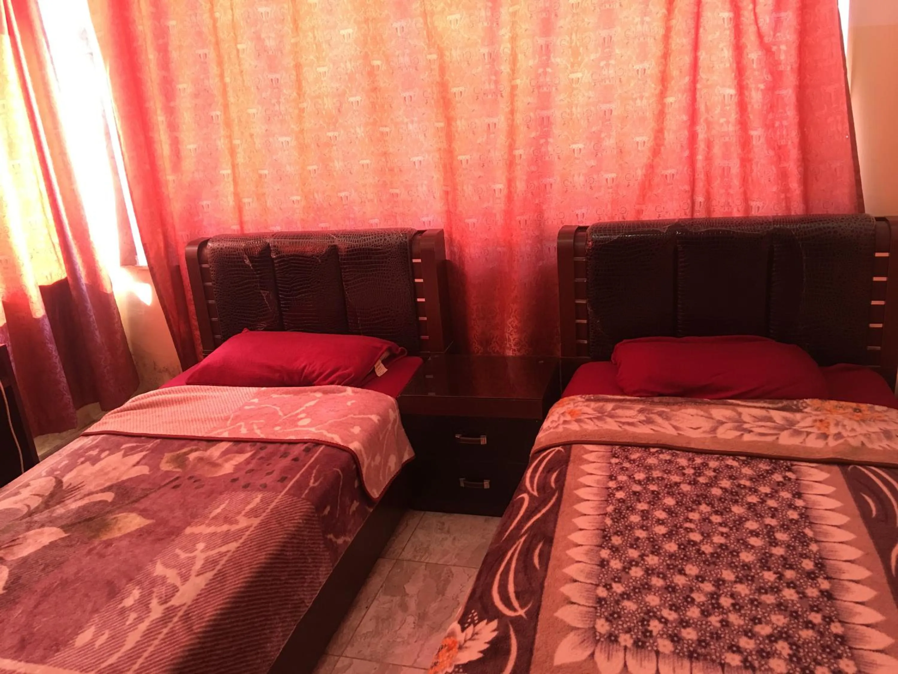 Bedroom in Aljazeera Hotel Apartments