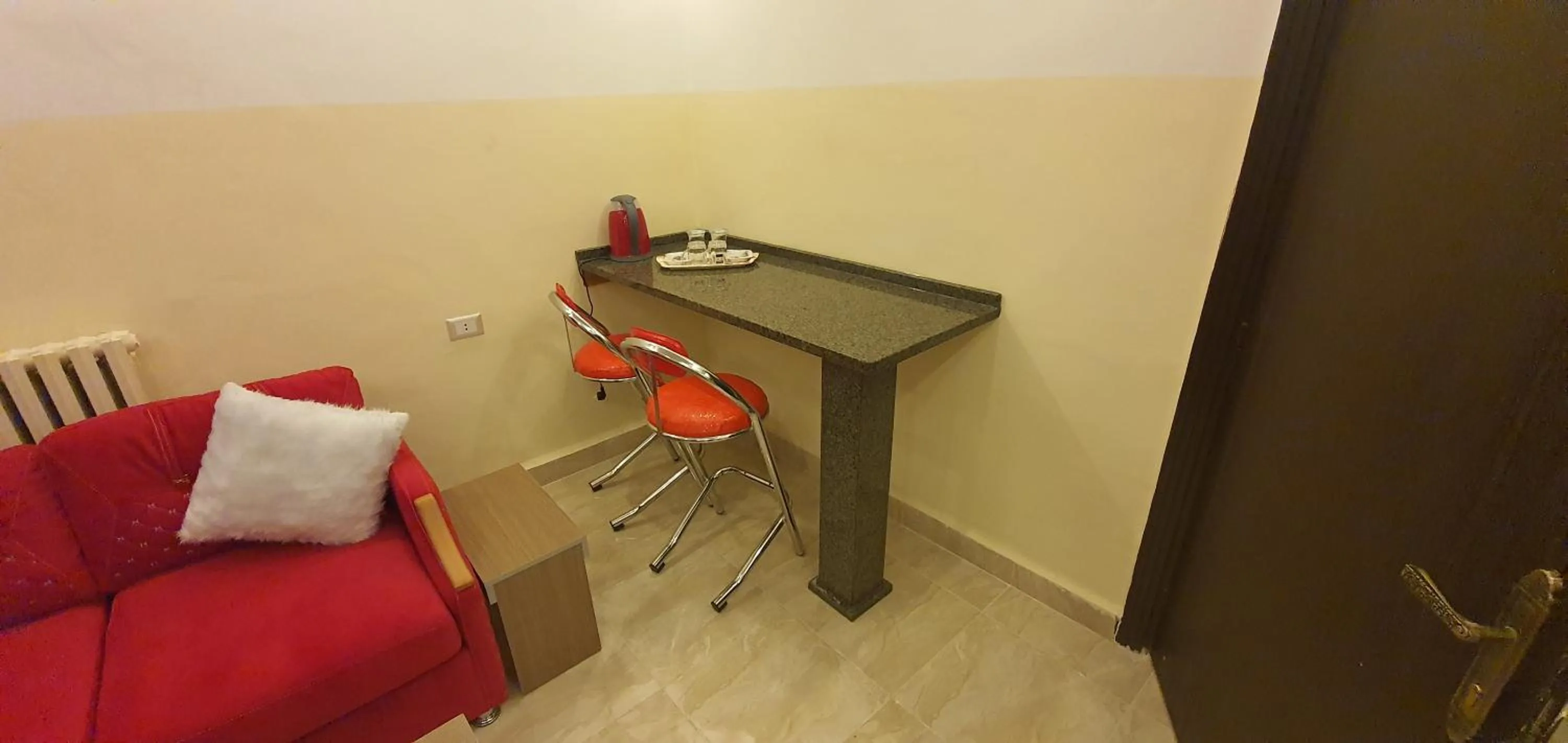 Living room in Aljazeera Hotel Apartments