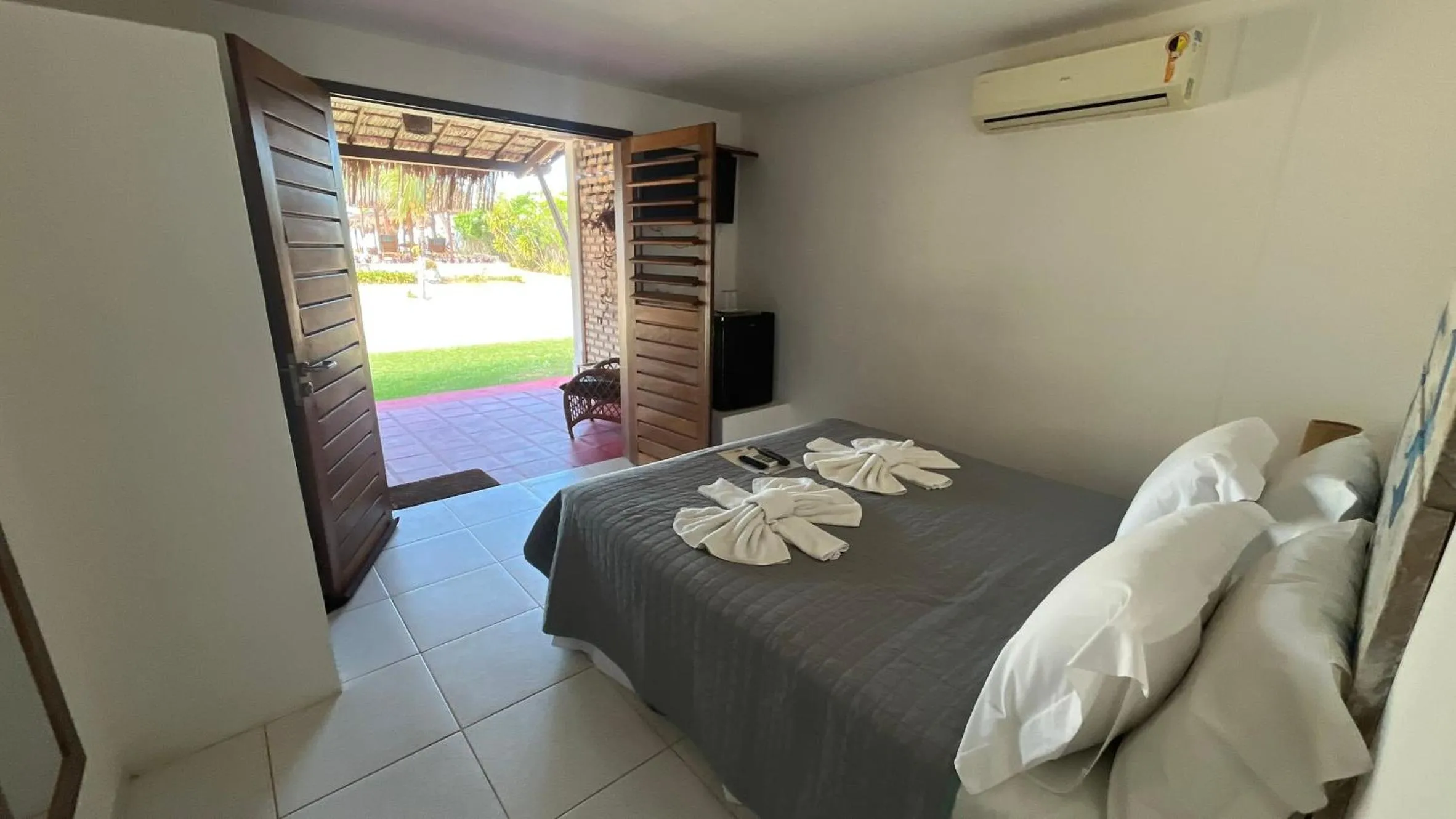 Bed in Recanto da Praia Pousada