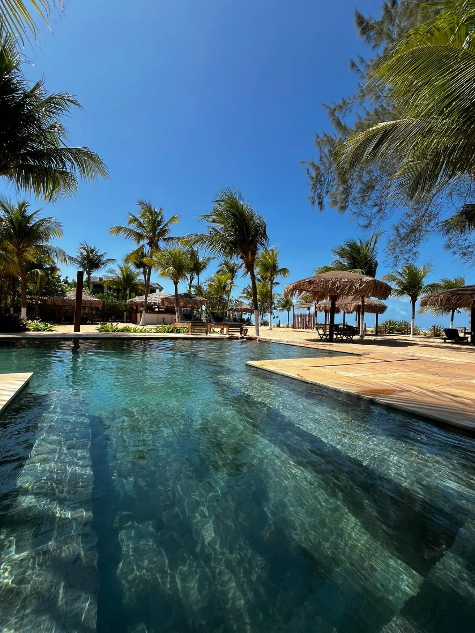Swimming pool in Recanto da Praia Pousada