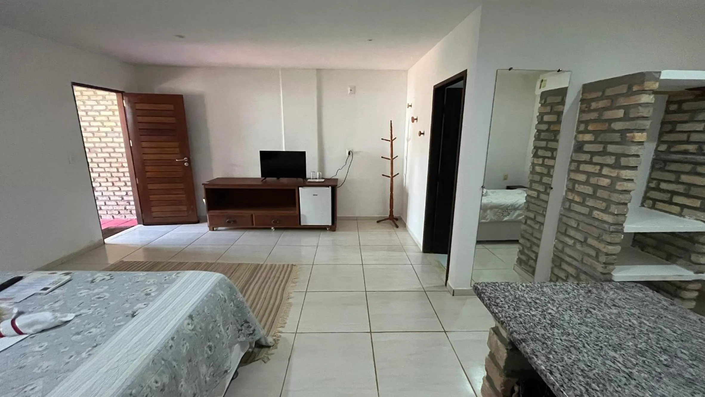 Bed in Recanto da Praia Pousada