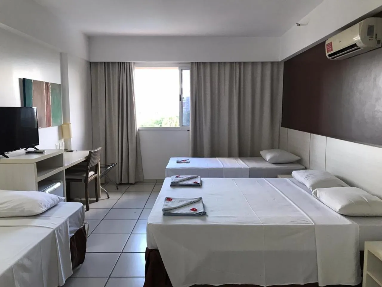 Bed in Pousada do Ipê