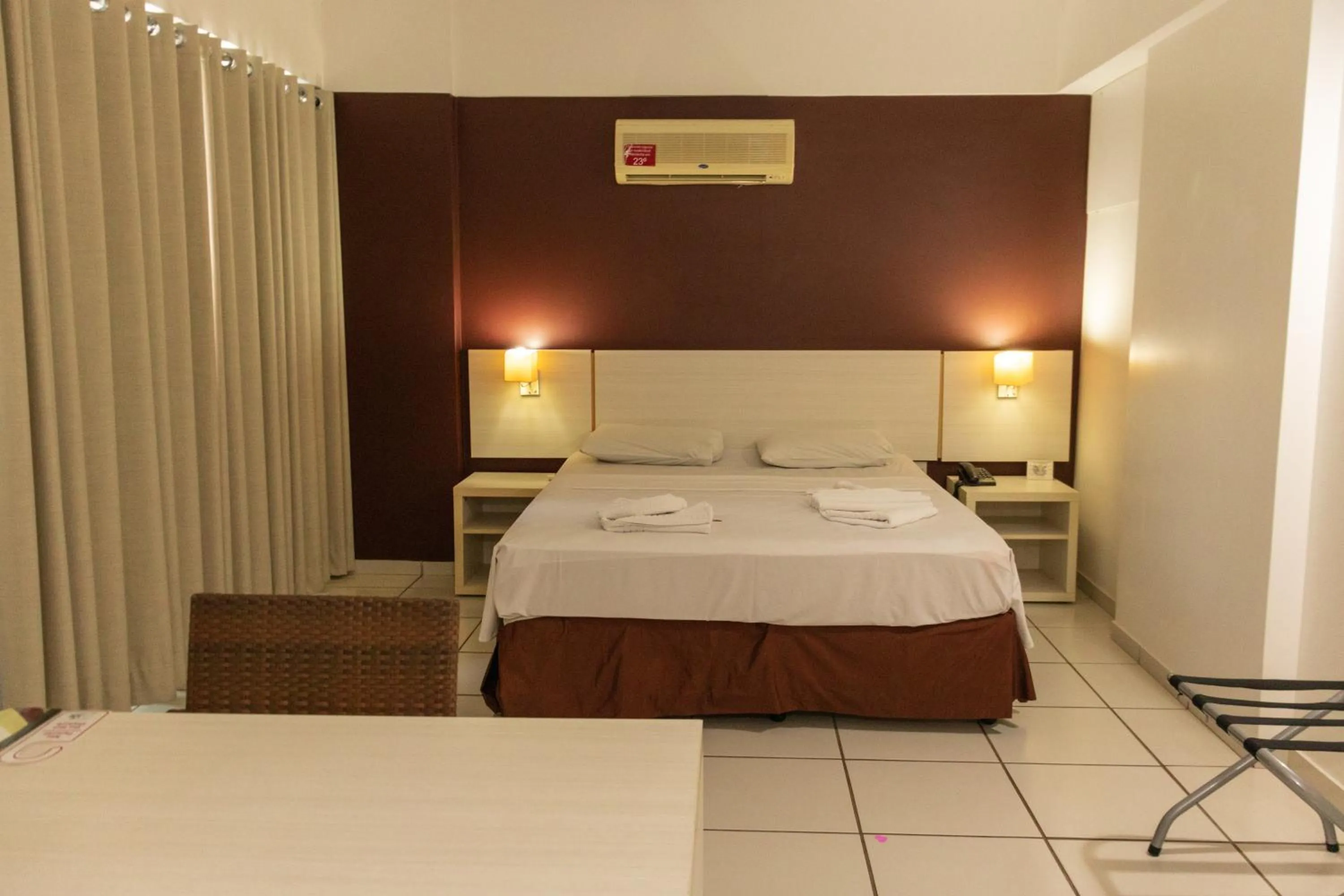 Bed in Pousada do Ipê