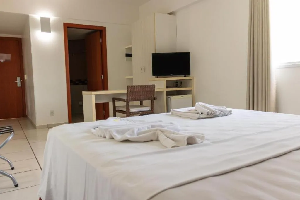 Bed in Pousada do Ipê