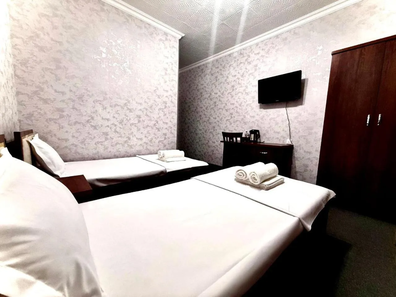 Bed in Hafiz Plaza Hotel