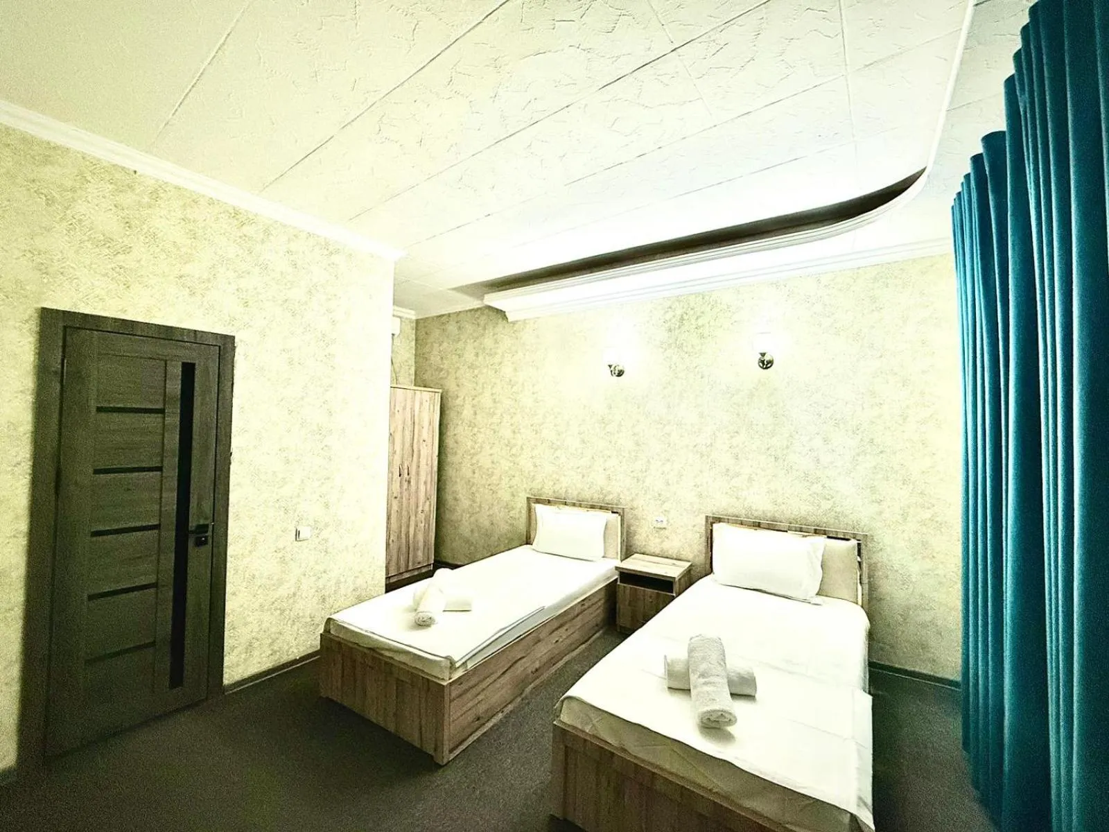 Bed in Hafiz Plaza Hotel