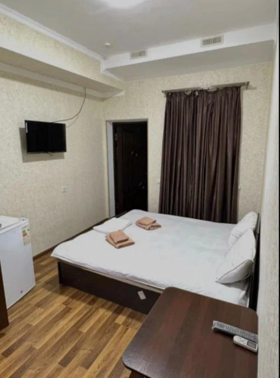 towels, Bed in Hafiz Plaza Hotel