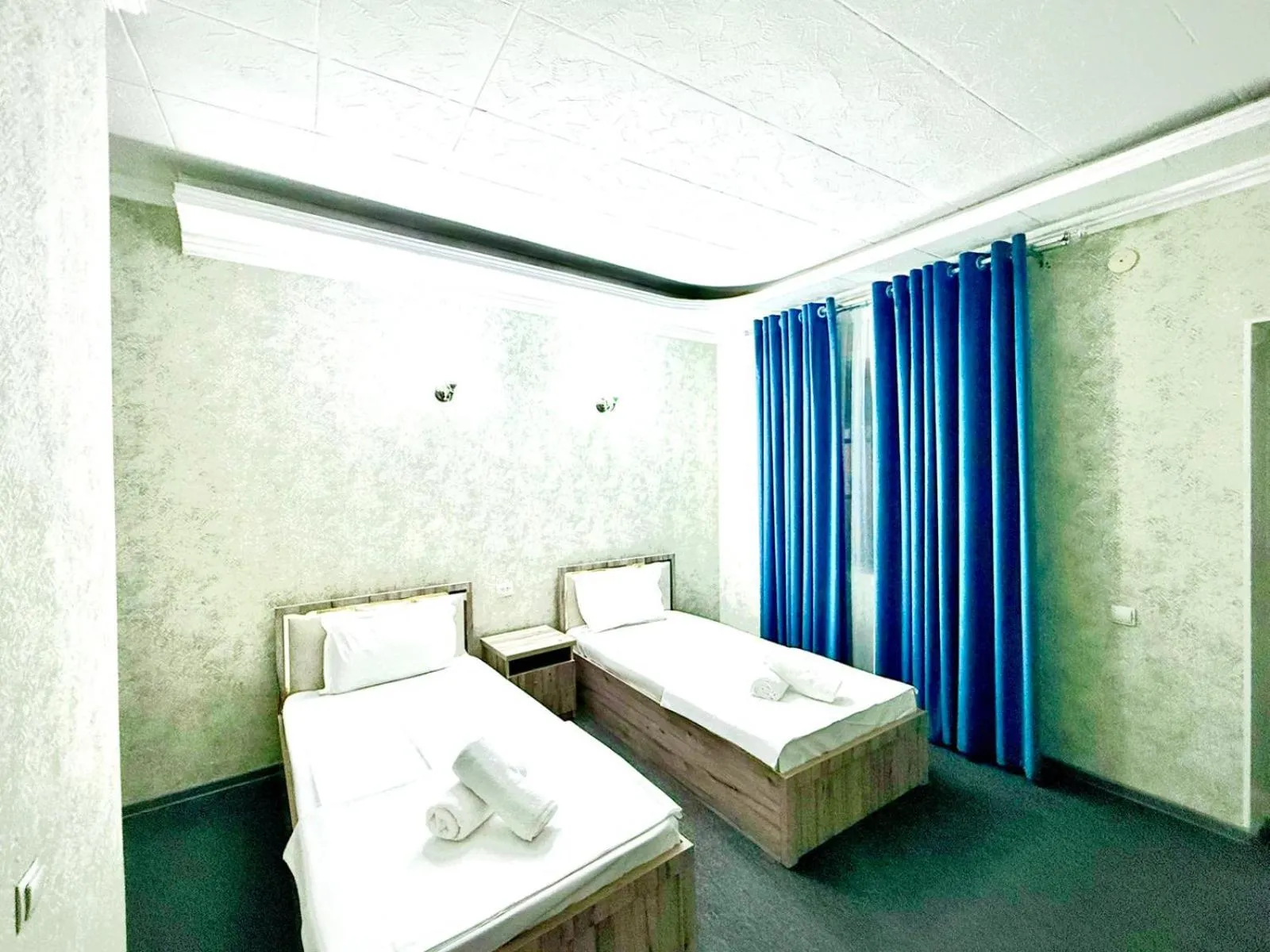 towels, Bed in Hafiz Plaza Hotel