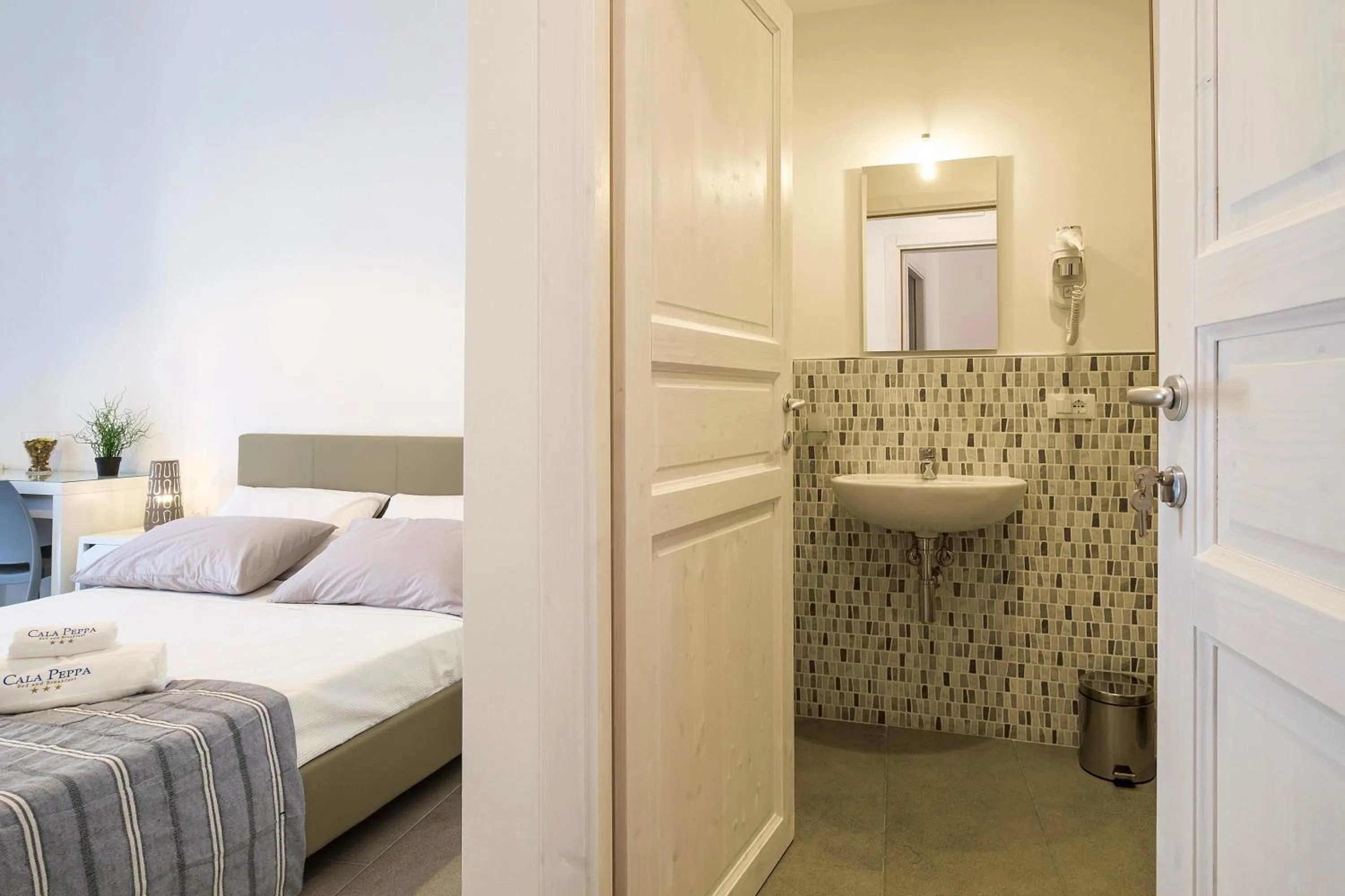 Bed in B&B Cala Peppa