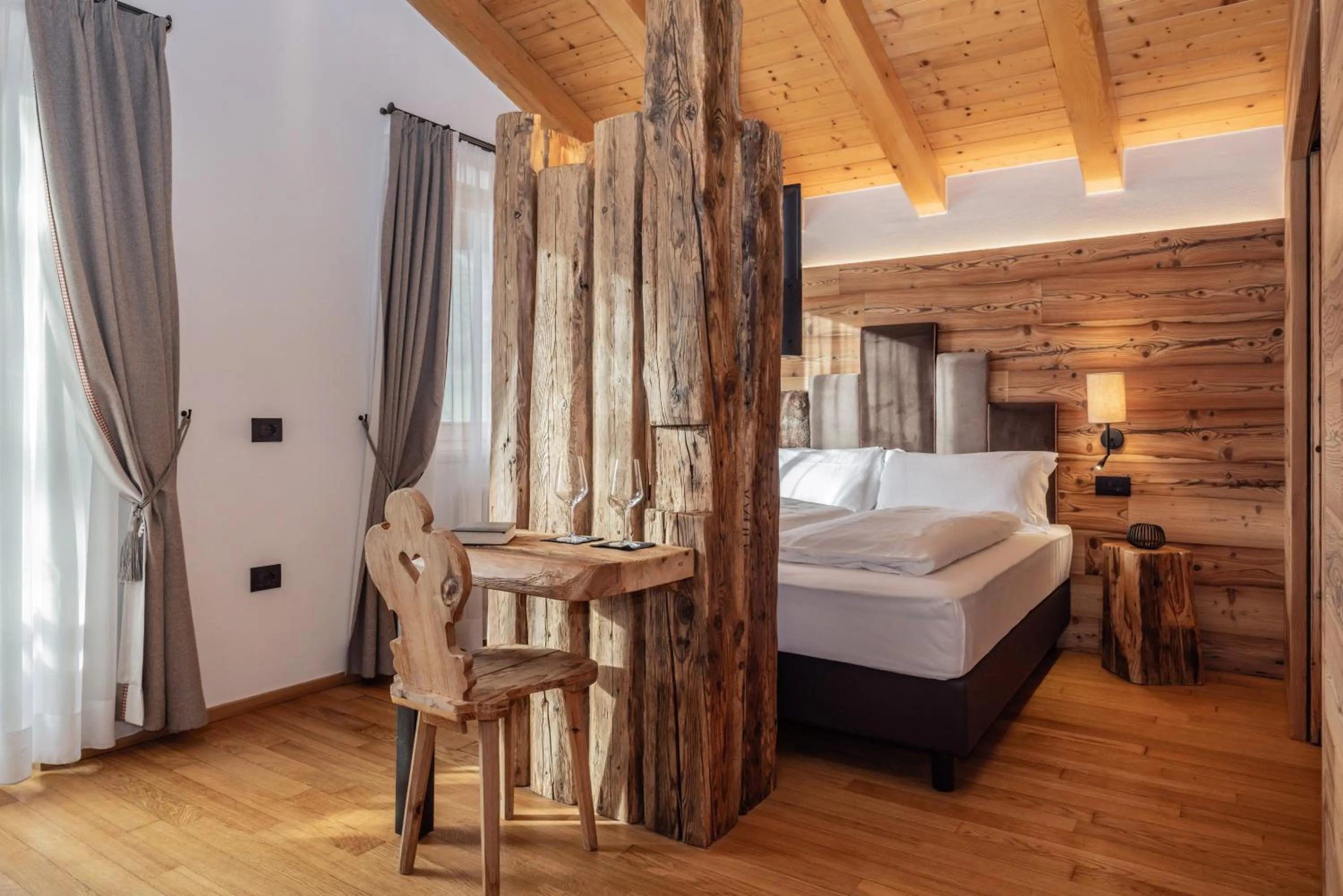 Bed in Hotel Ravelli Luxury Spa