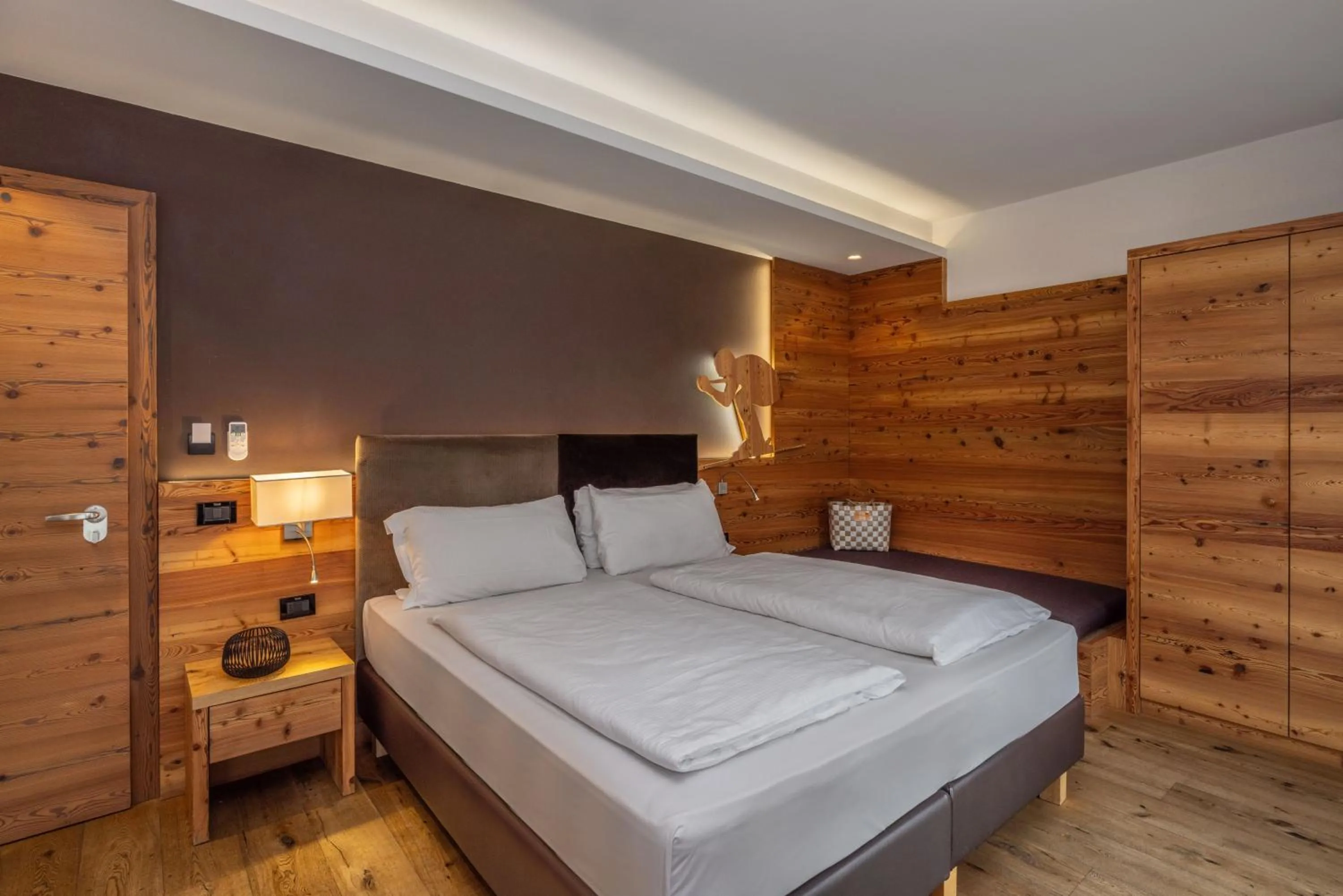 Bed in Hotel Ravelli Luxury Spa