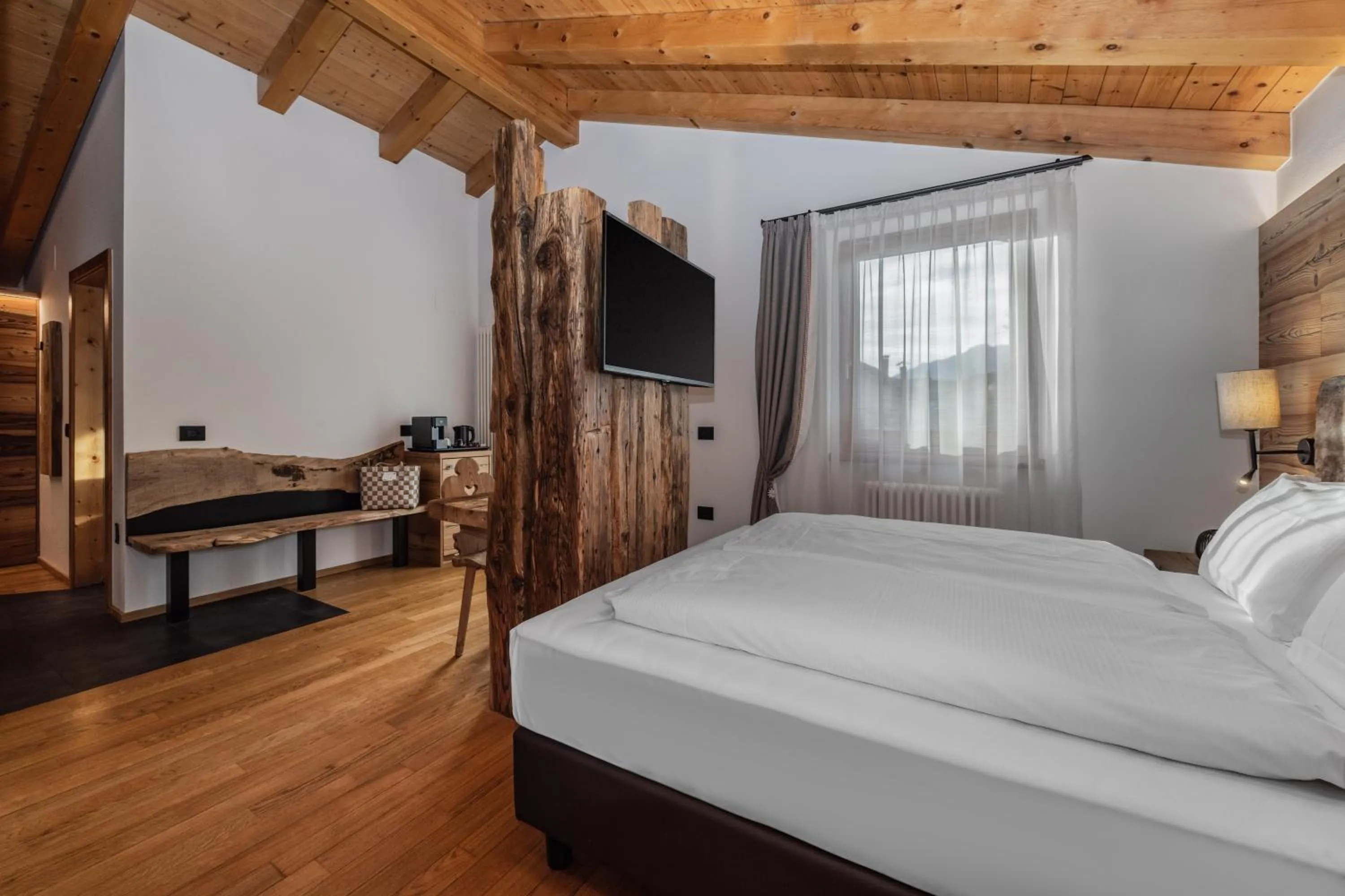 Bed in Hotel Ravelli Luxury Spa