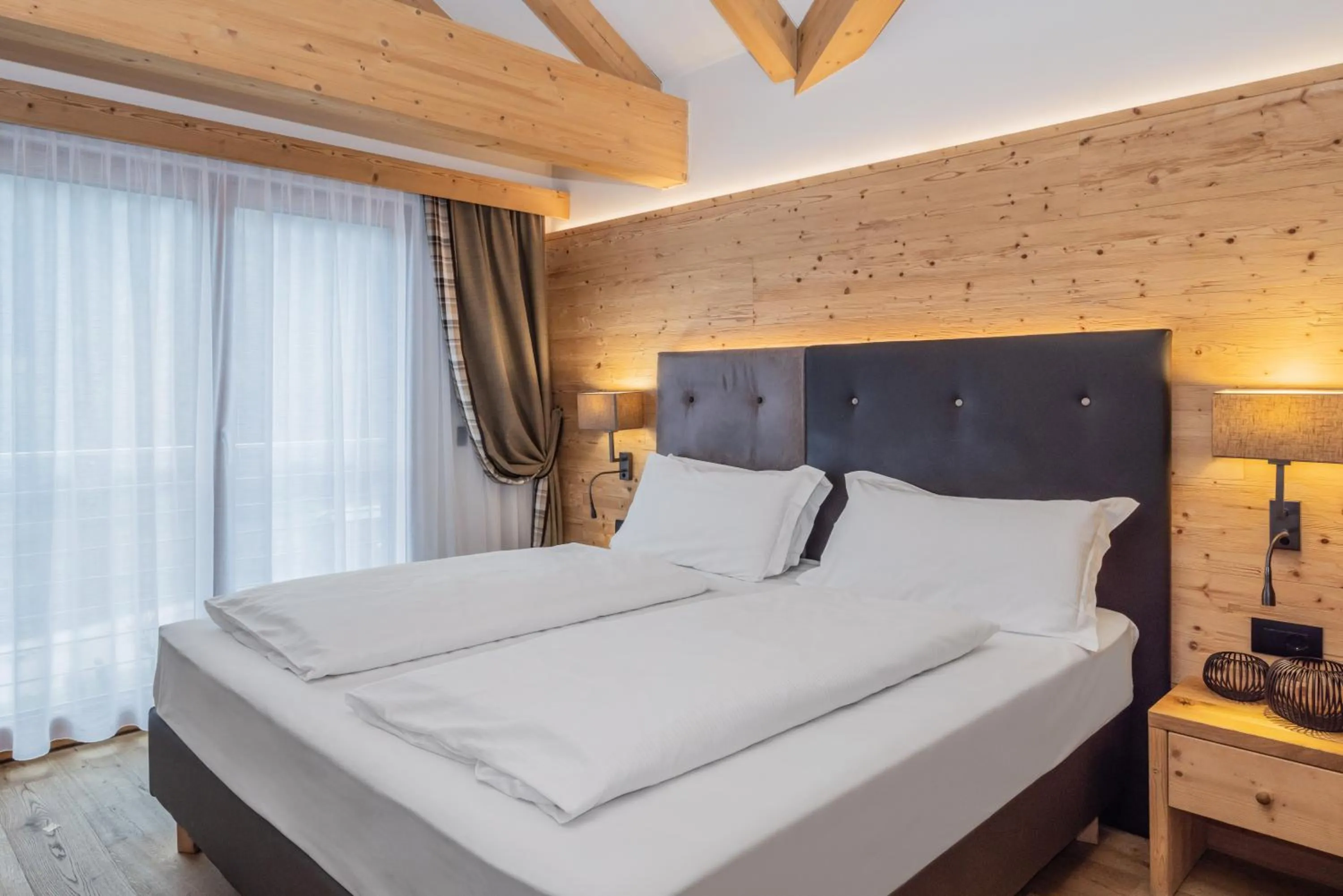 Bed in Hotel Ravelli Luxury Spa