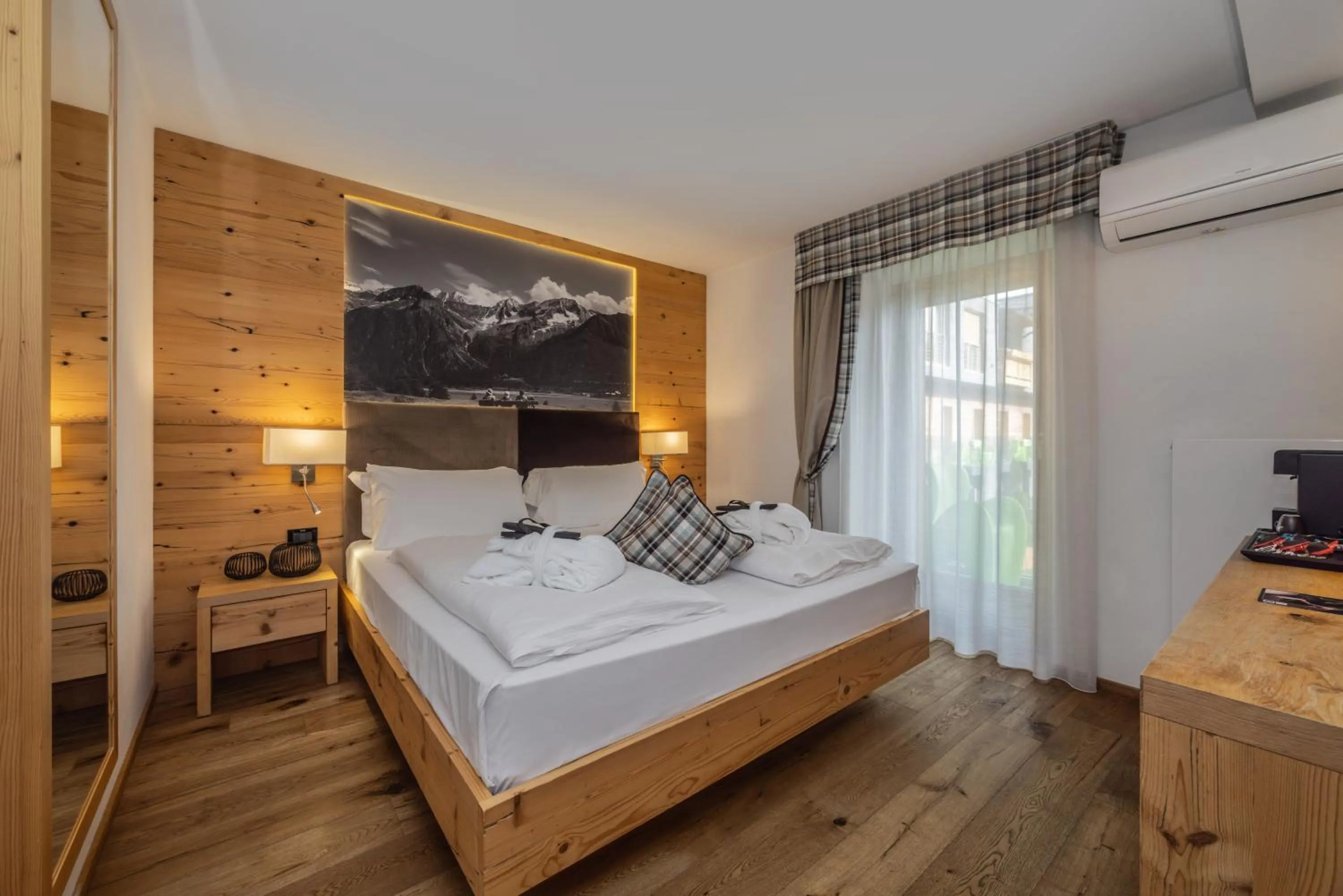 Bed in Hotel Ravelli Luxury Spa