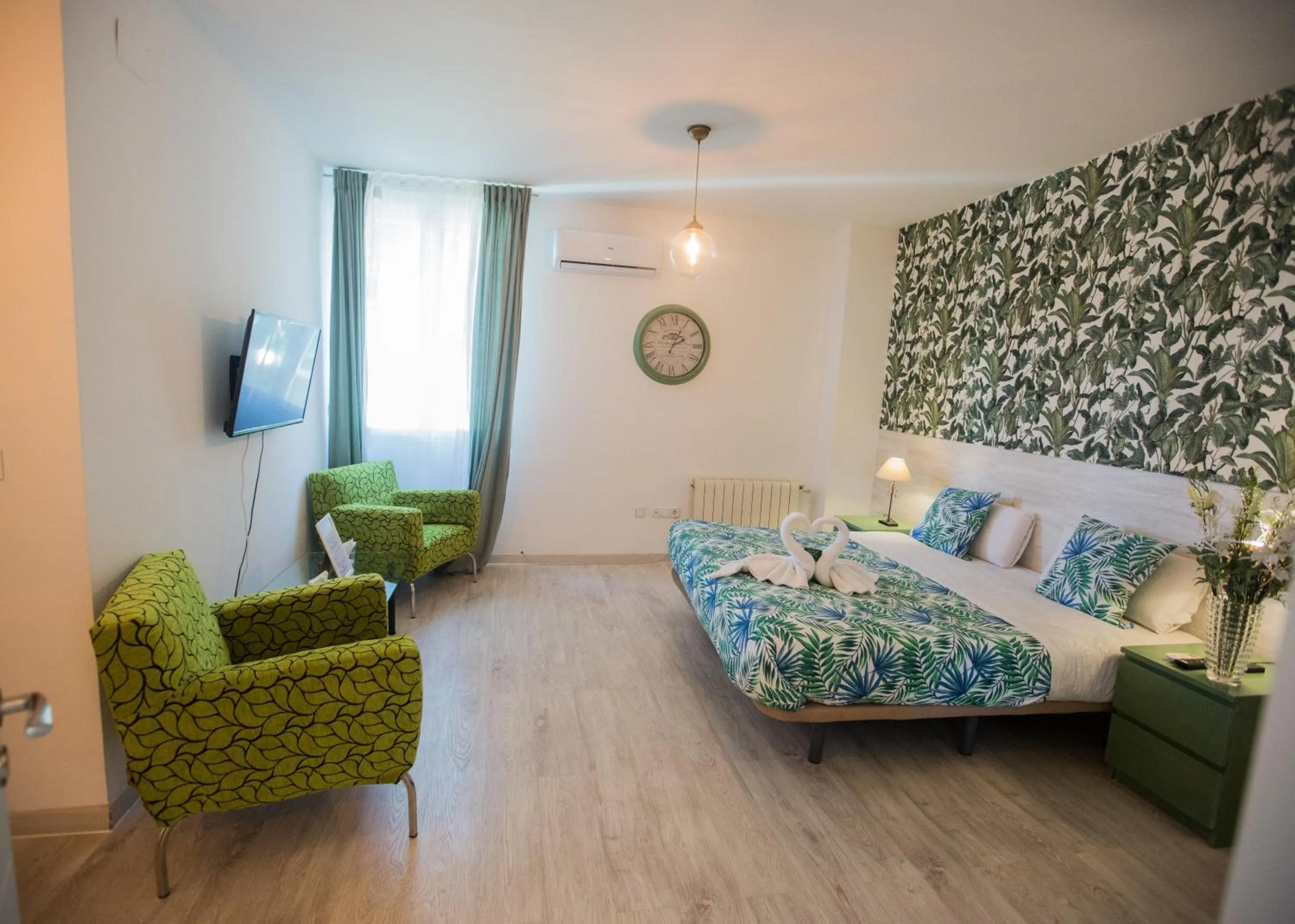 Bed in Hostal Escala Suites