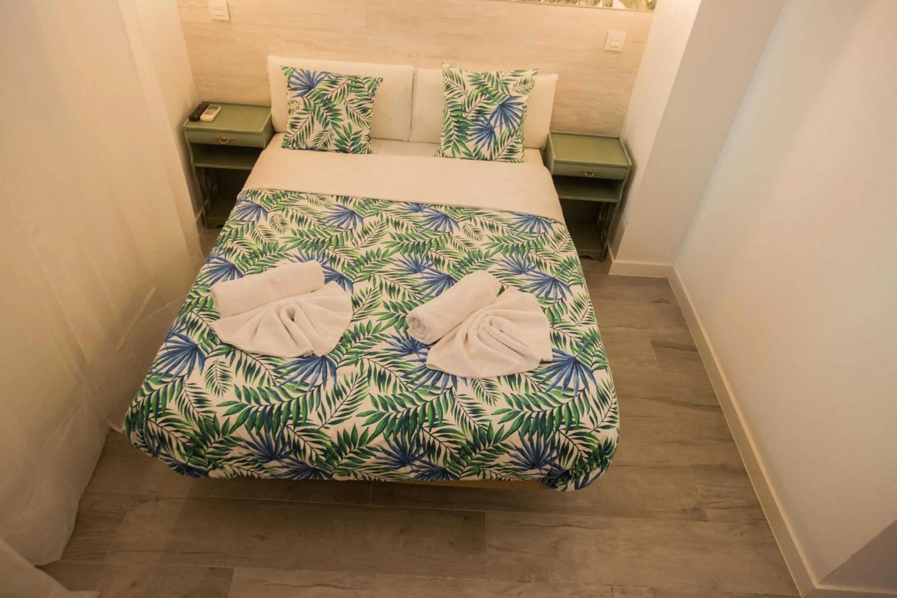 Bed in Hostal Escala Suites