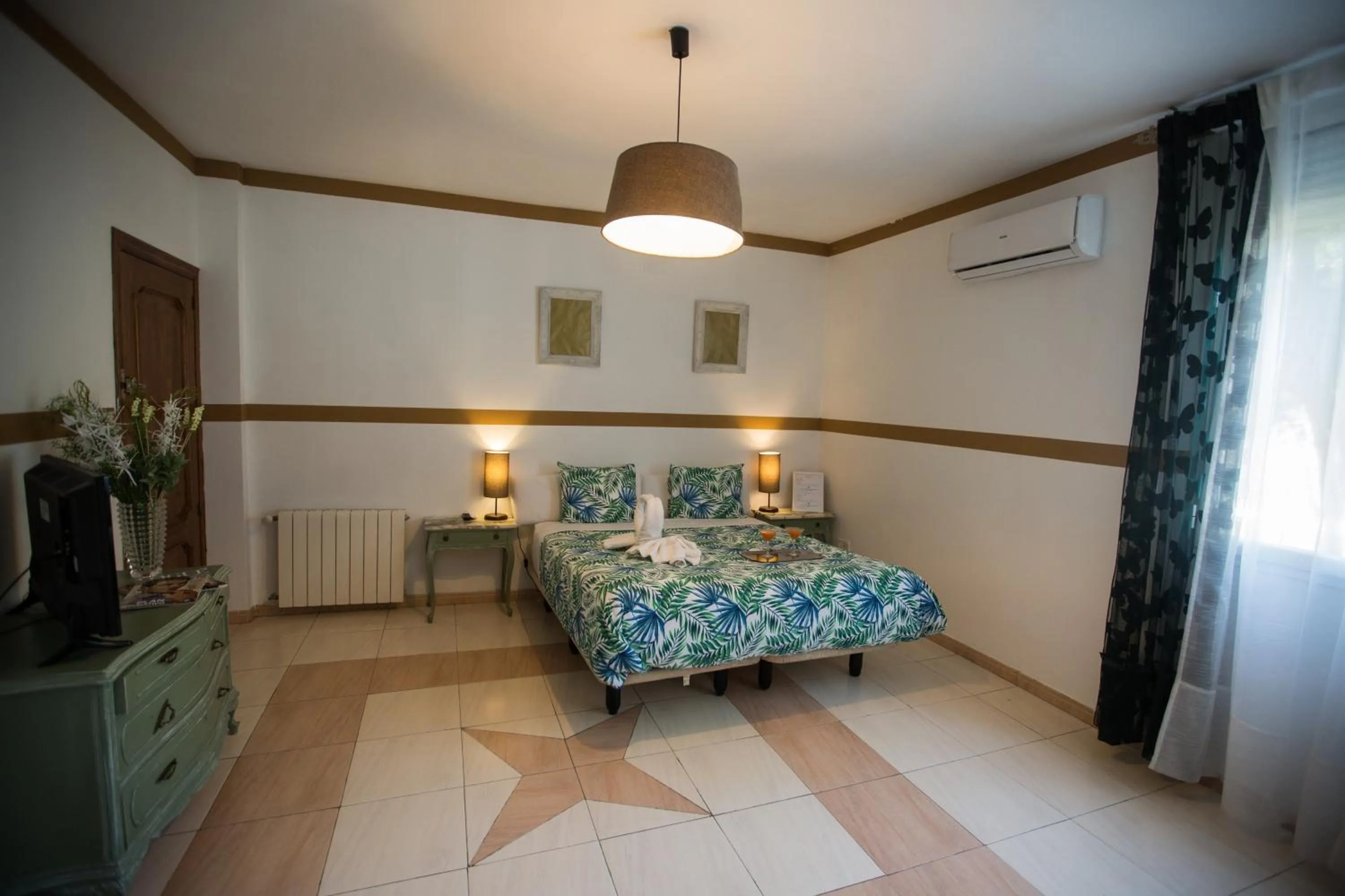 Bed in Hostal Escala Suites