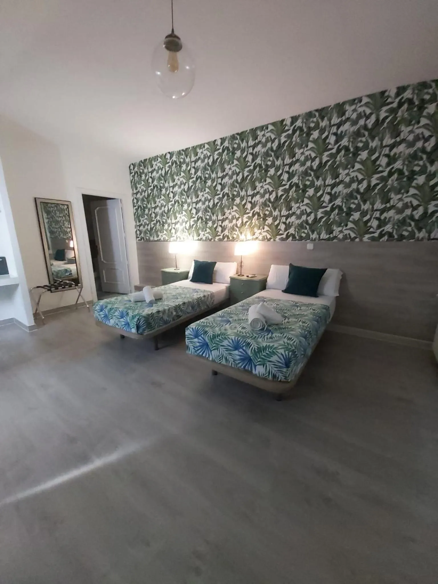 Bed in Hostal Escala Suites