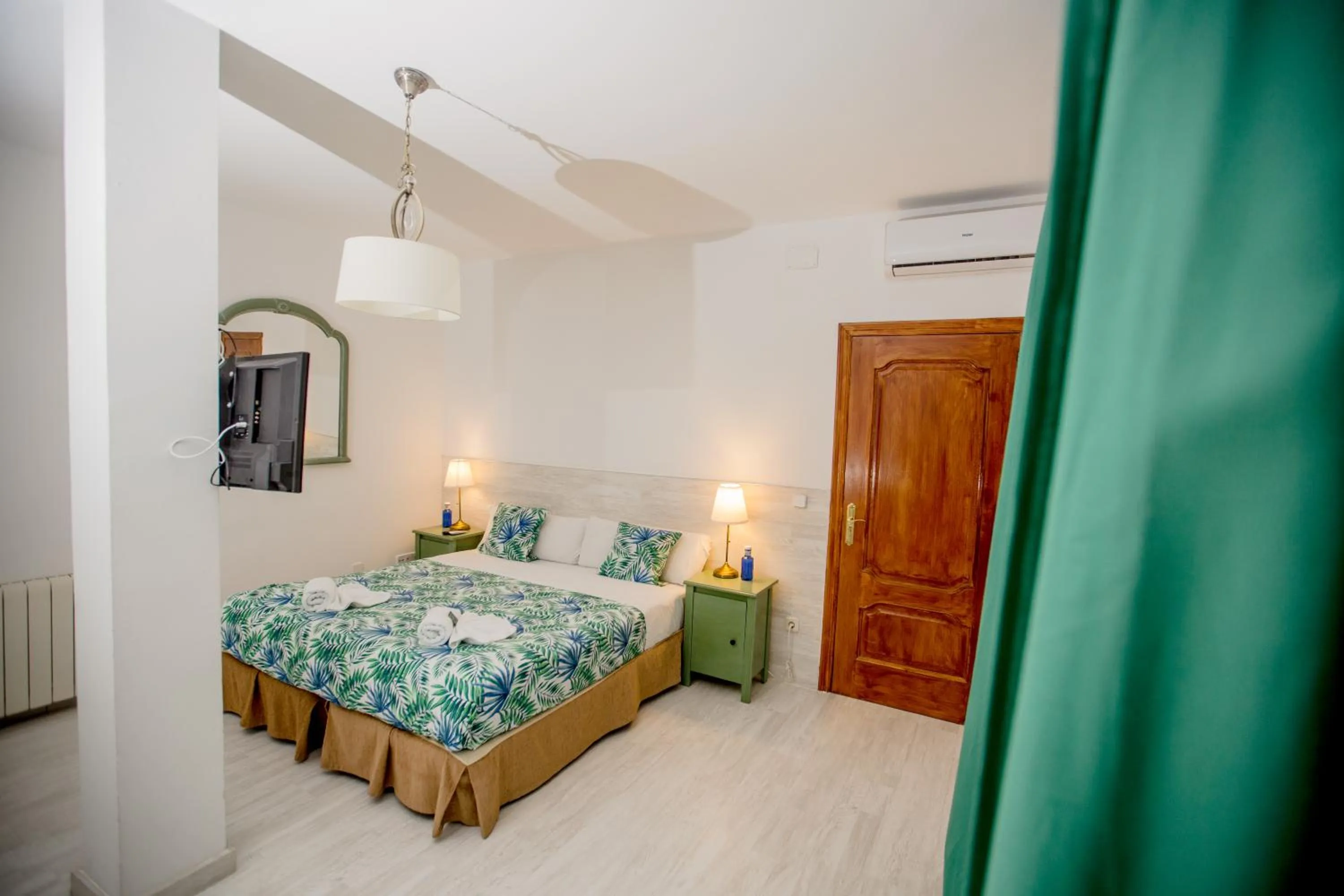 Bed in Hostal Escala Suites