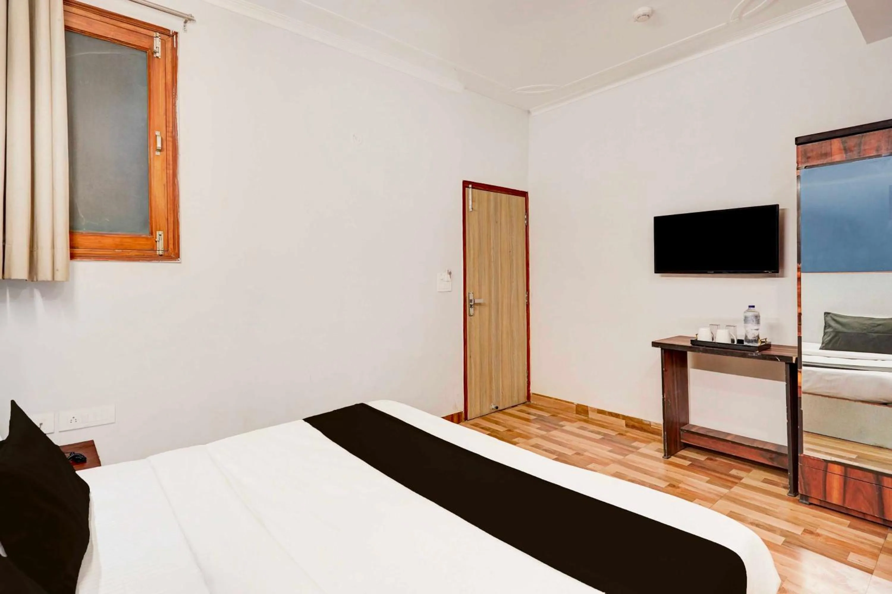 Bedroom, Bed in Hotel O Noida Sector 16 Metro Station