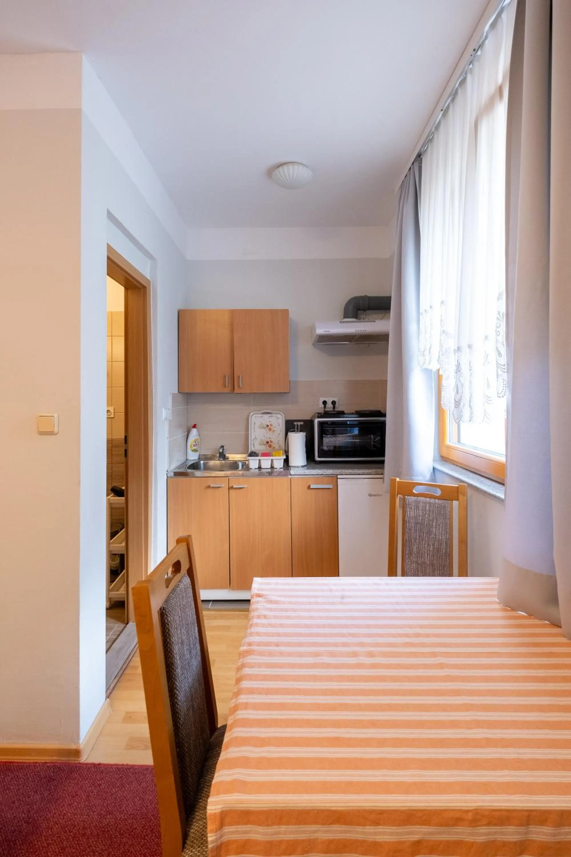 Kitchen or kitchenette, Bed in Guesthouse Rose