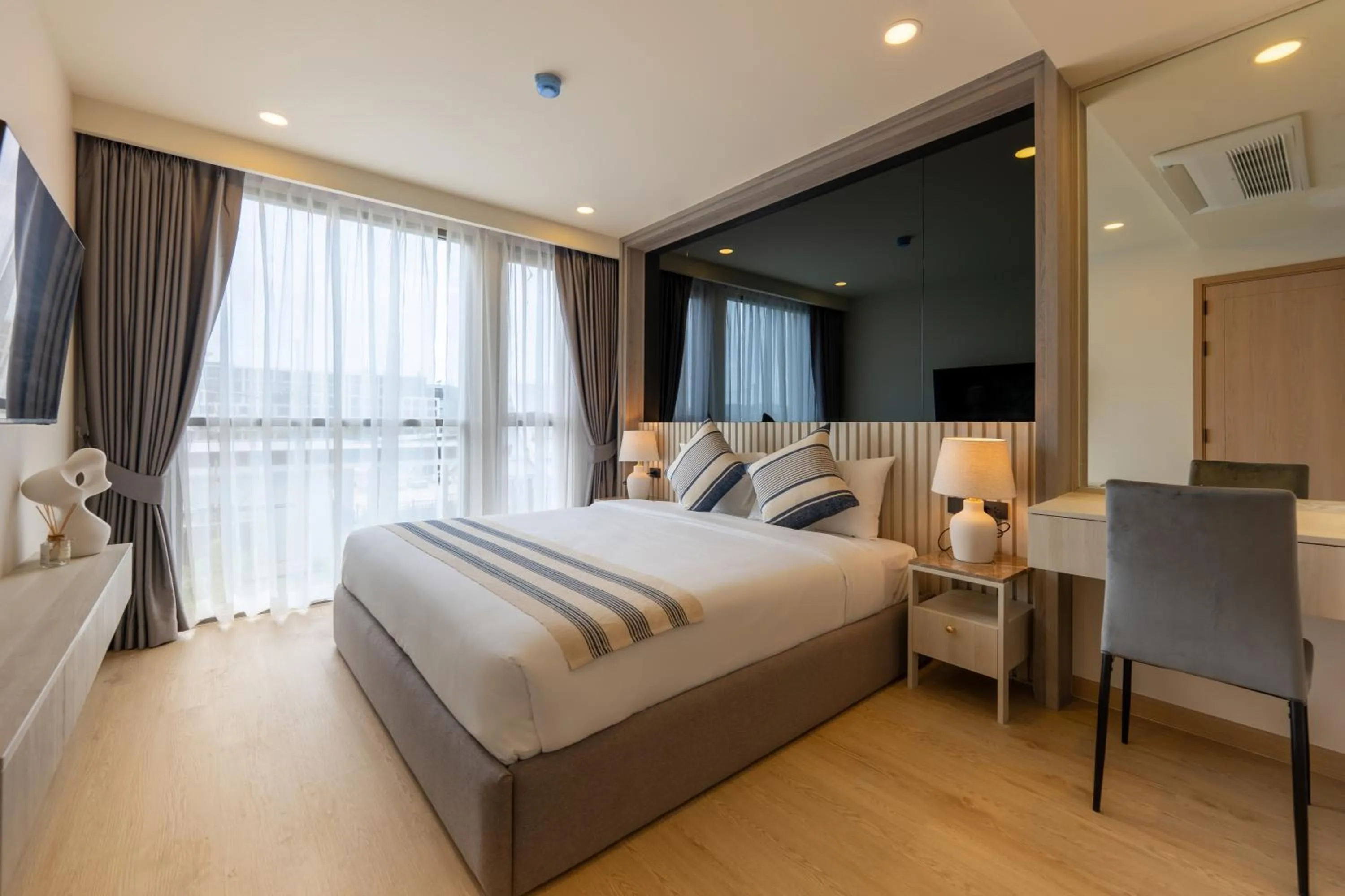 Bed in The Ozone Residences Bangtao