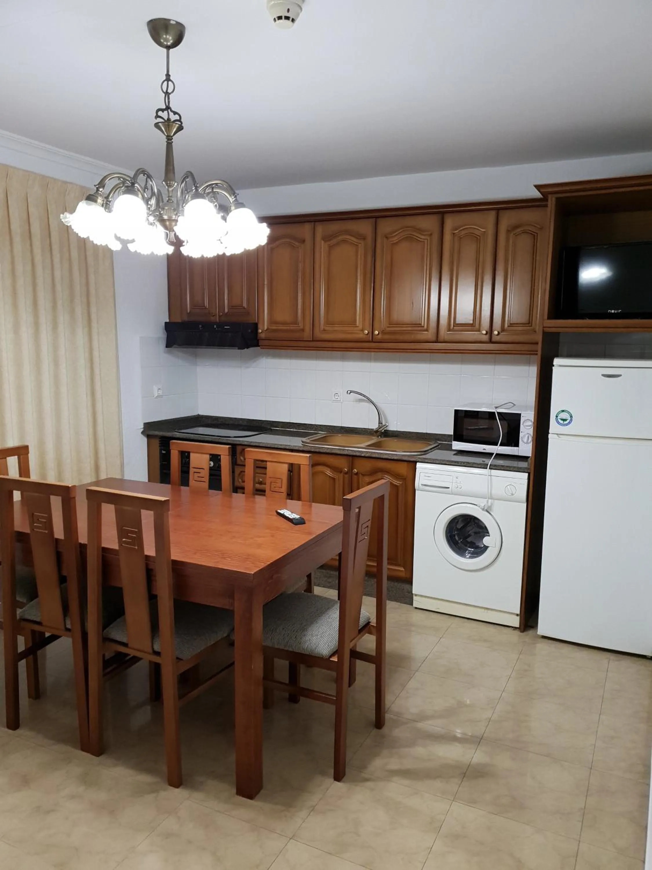 Kitchen or kitchenette in Complejo Turistico la Pinada