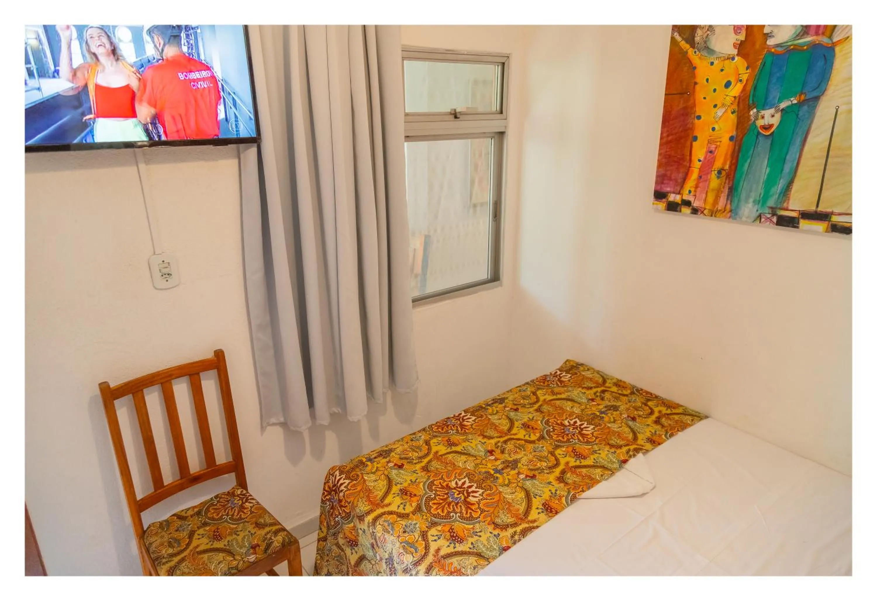 Photo of the whole room, Bed in Pousada Cravo e Canela