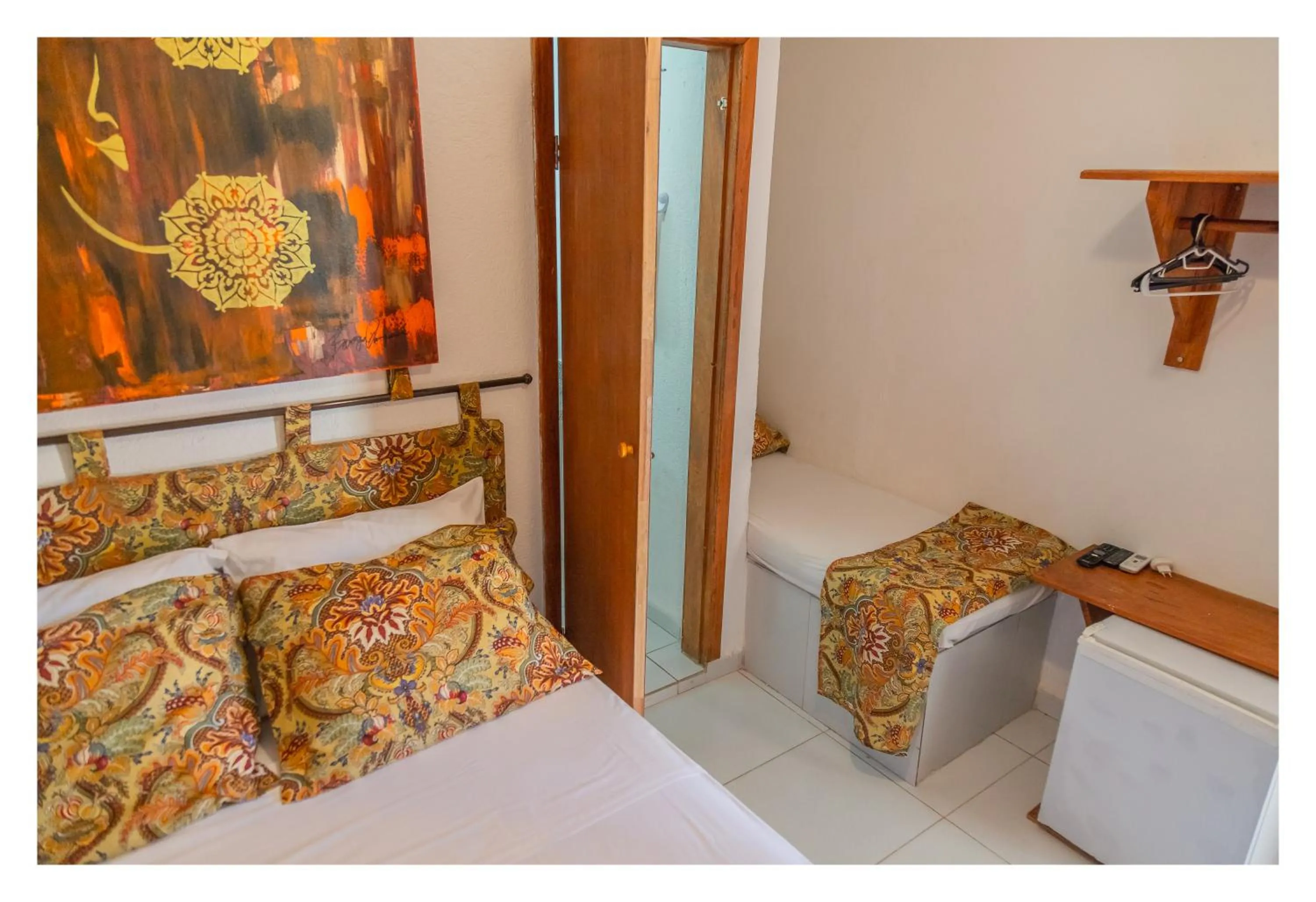 Photo of the whole room, Bed in Pousada Cravo e Canela