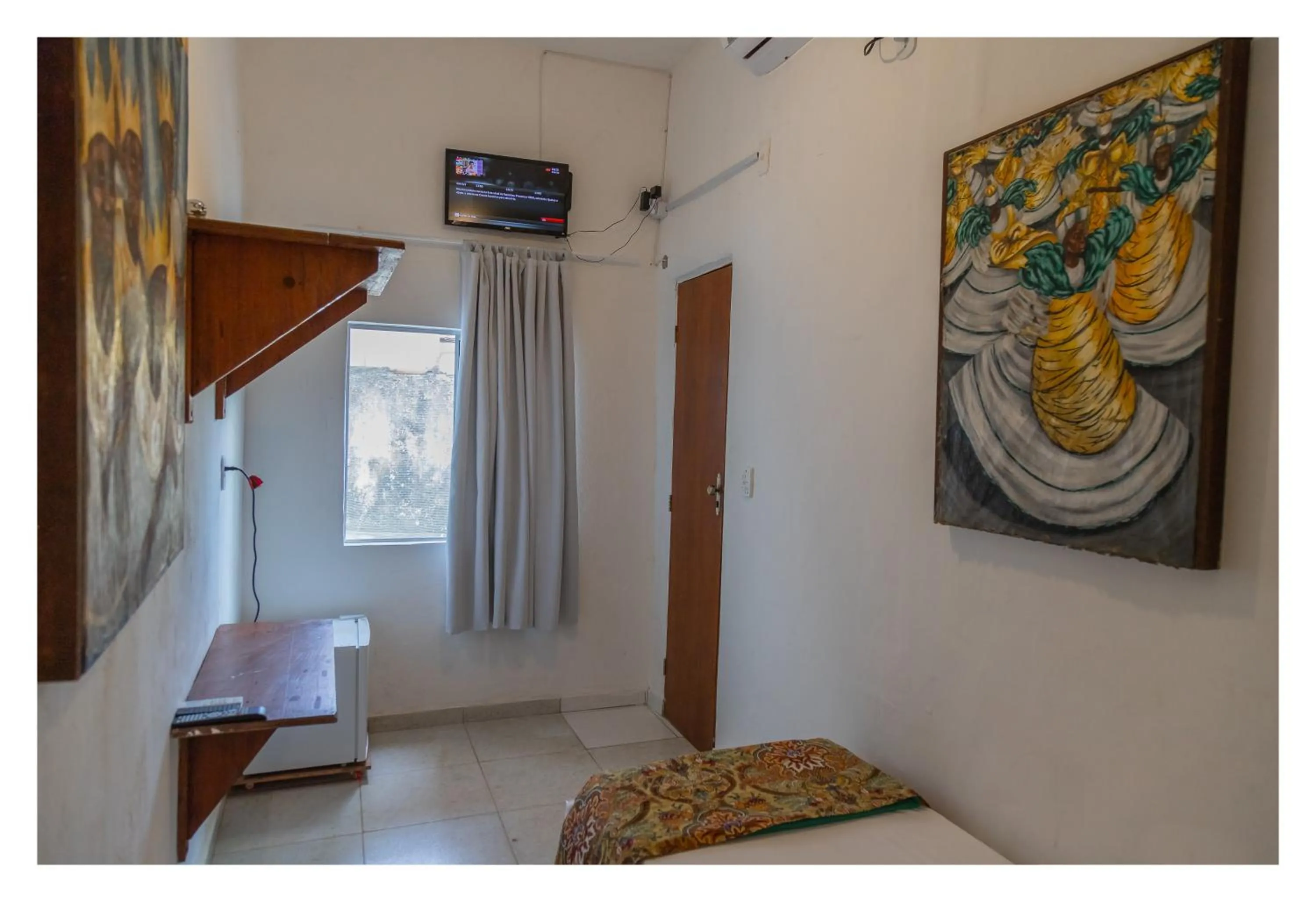 Photo of the whole room, Bed in Pousada Cravo e Canela