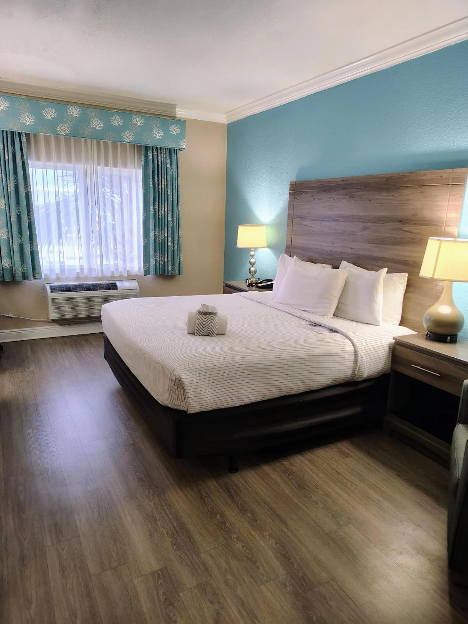 Bed in Amelia Hotel at the Beach