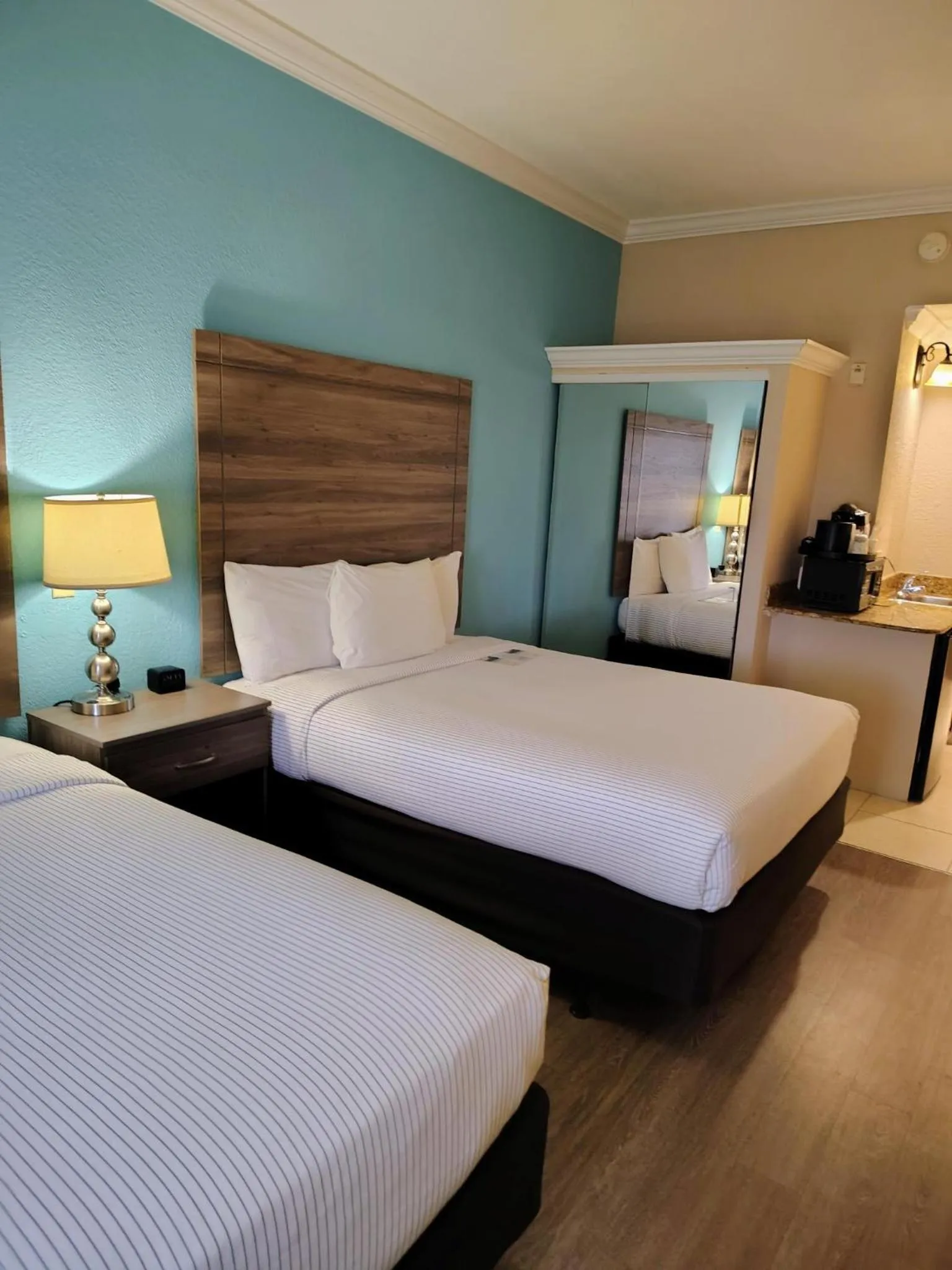 Bed in Amelia Hotel at the Beach