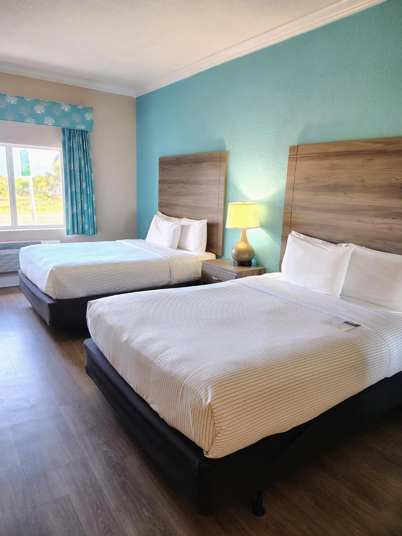 Bed in Amelia Hotel at the Beach