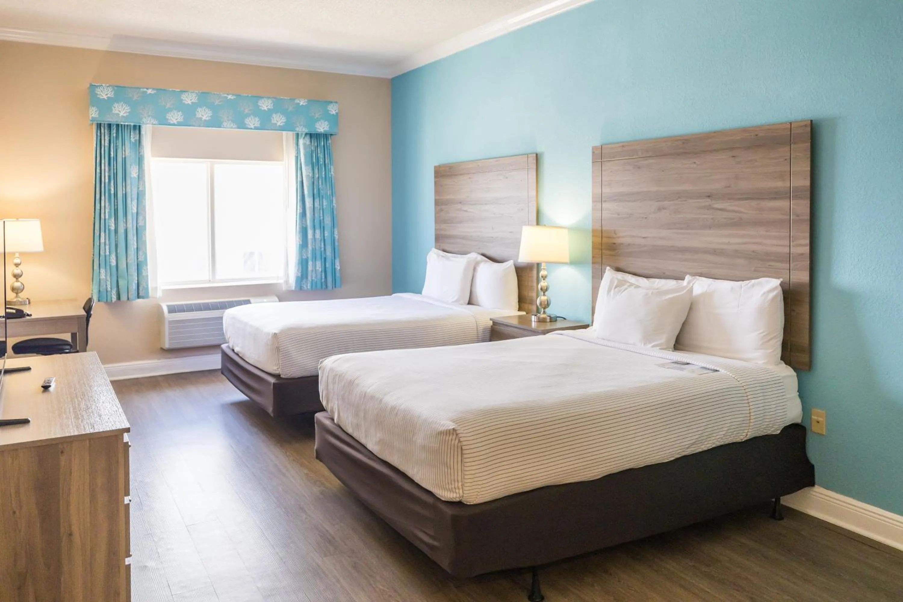 Bed in Amelia Hotel at the Beach