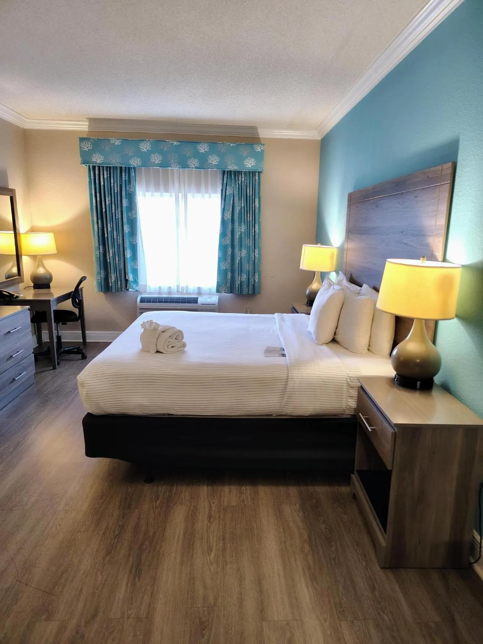 Bed in Amelia Hotel at the Beach