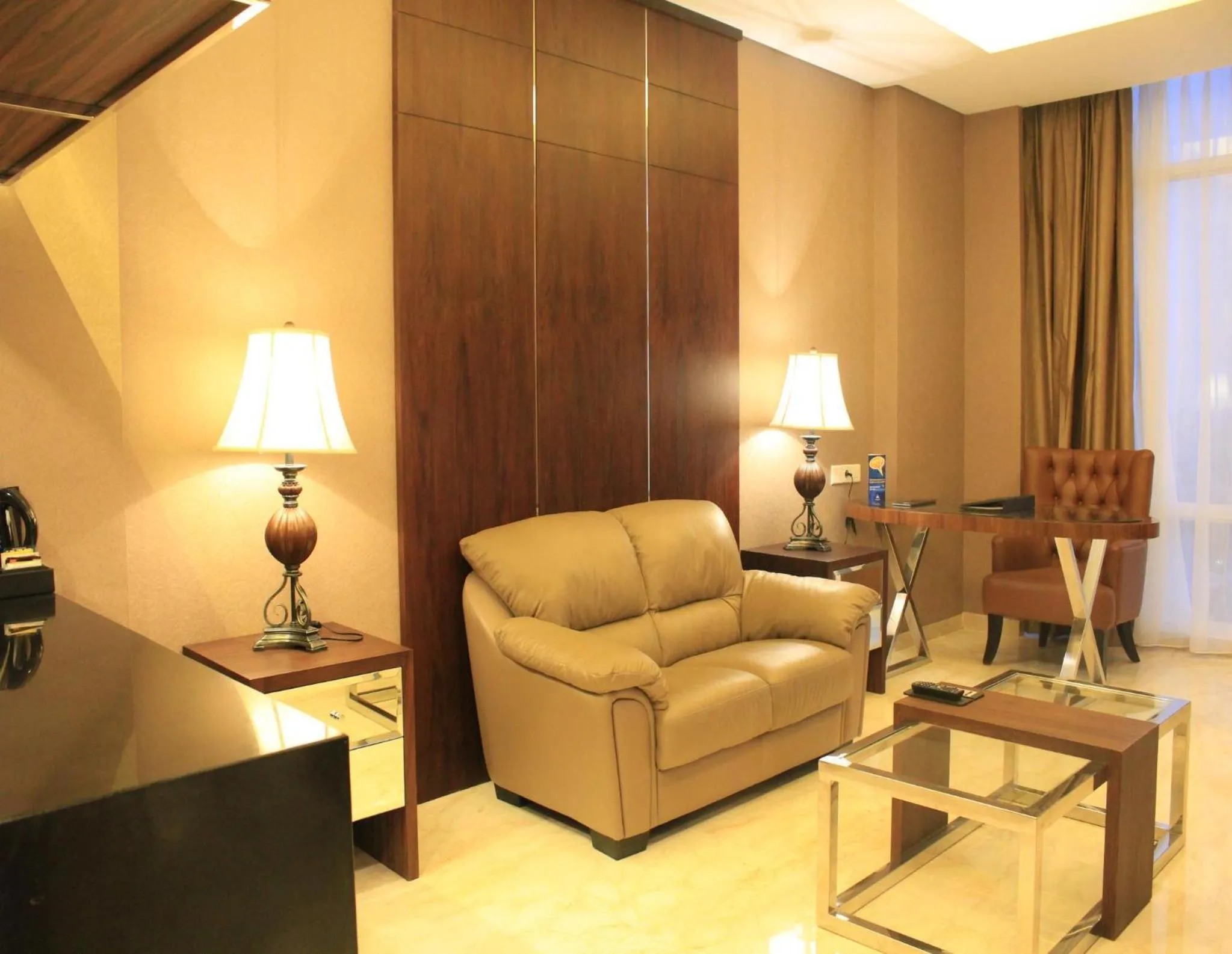 Living room in Grand Mercure Solo Baru
