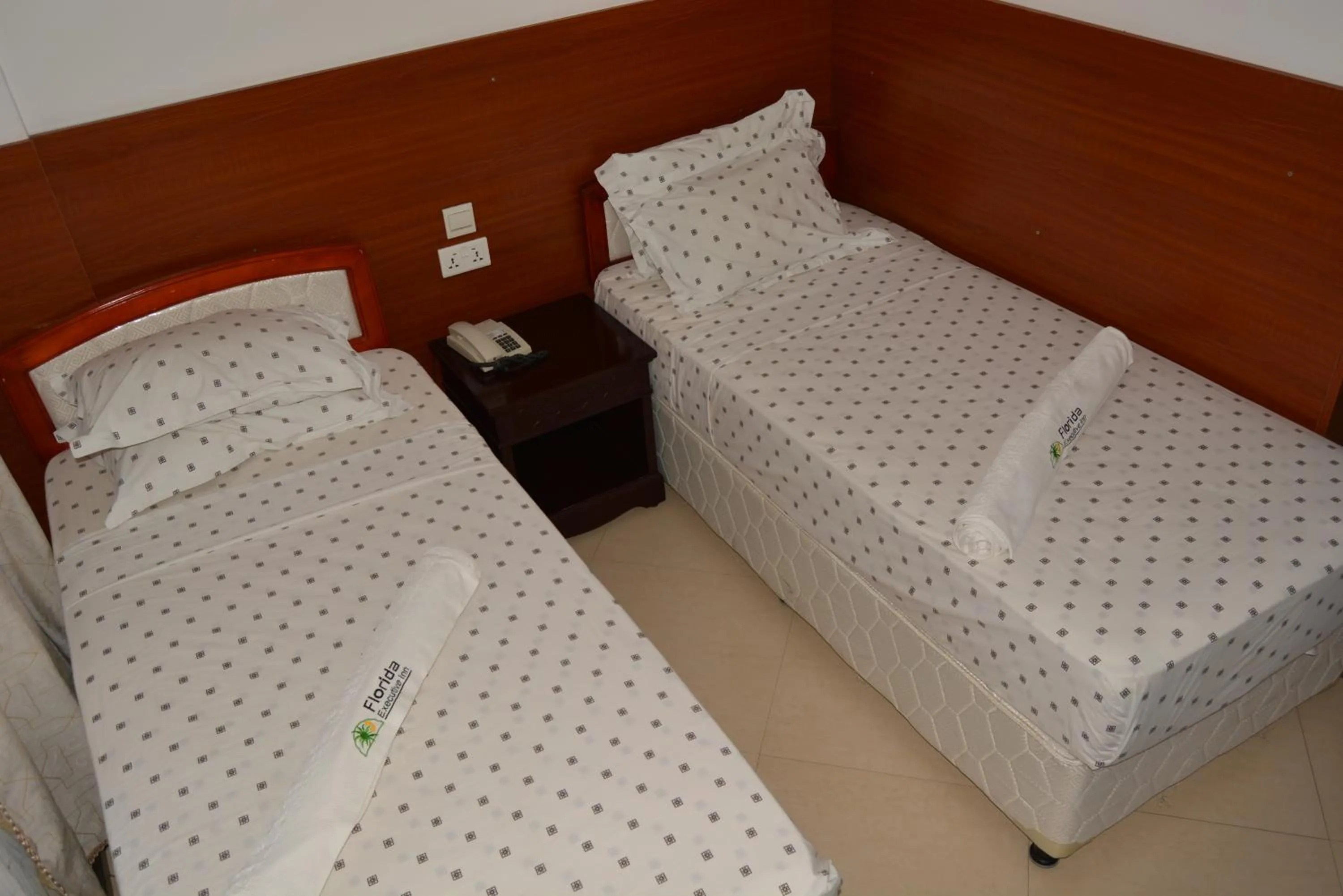 Bed in Florida Executive Inn