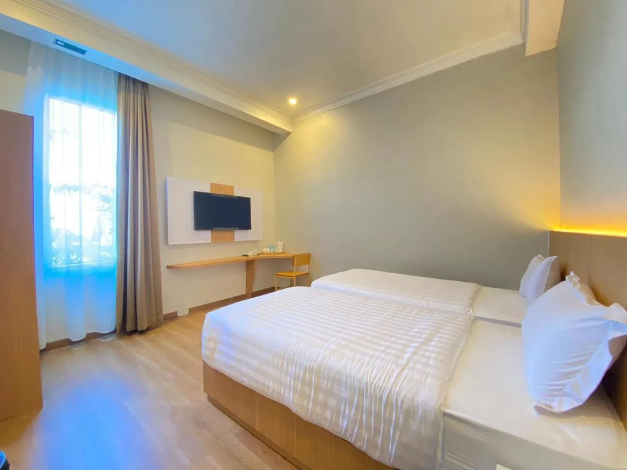 Bed in Garuda Hotel By Calandra