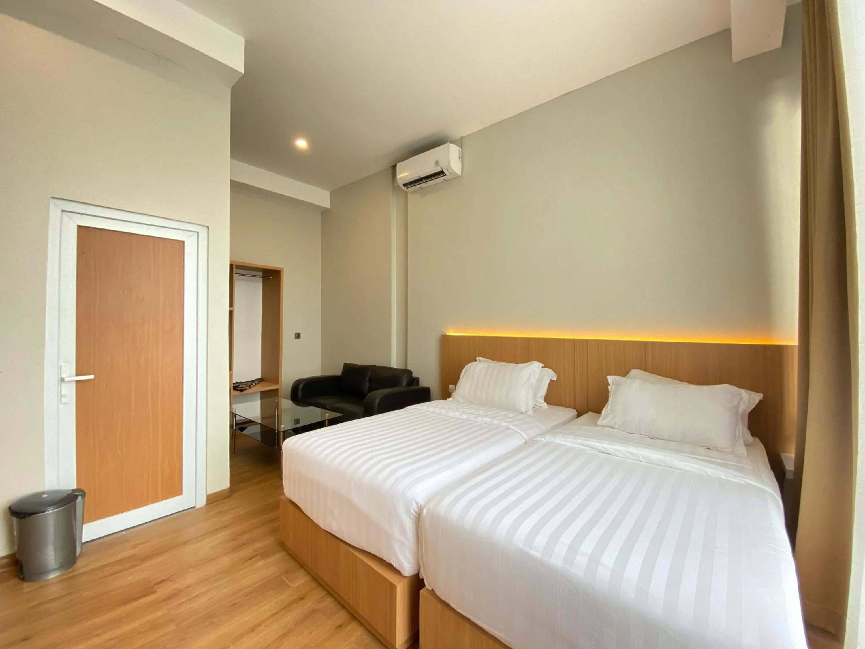 Bed in Garuda Hotel By Calandra