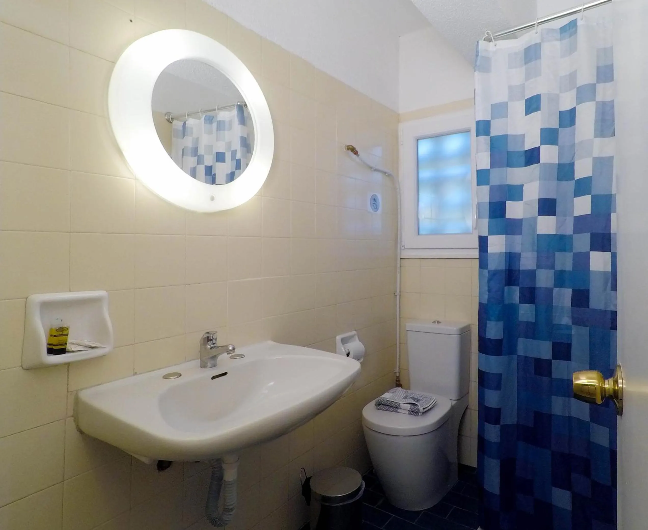 Bathroom in Blue Era Apartments
