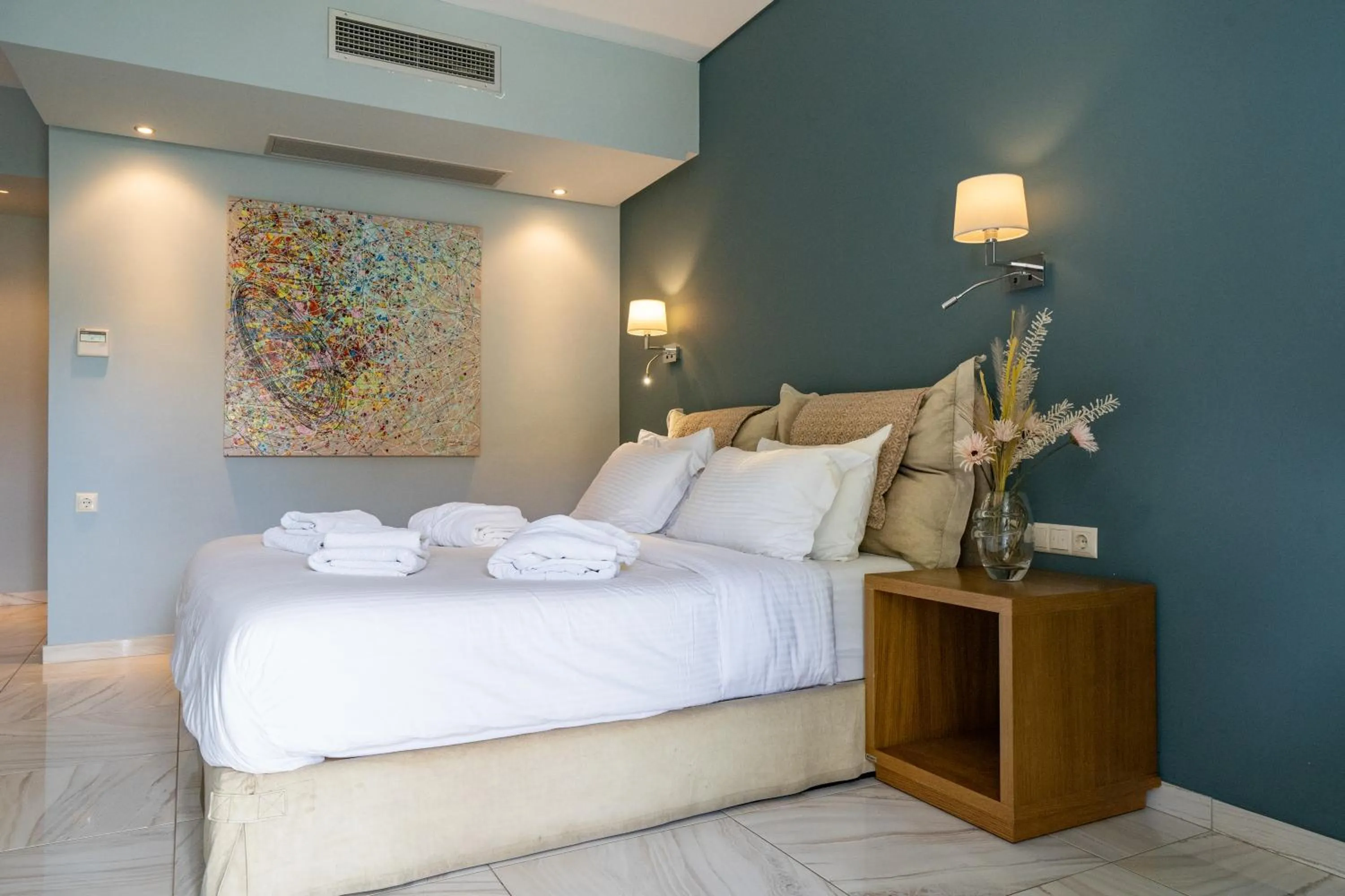 Bed in Edem Luxury Apartments