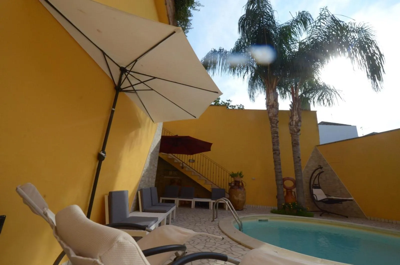 Swimming pool in B&B Corte Dei Figuli